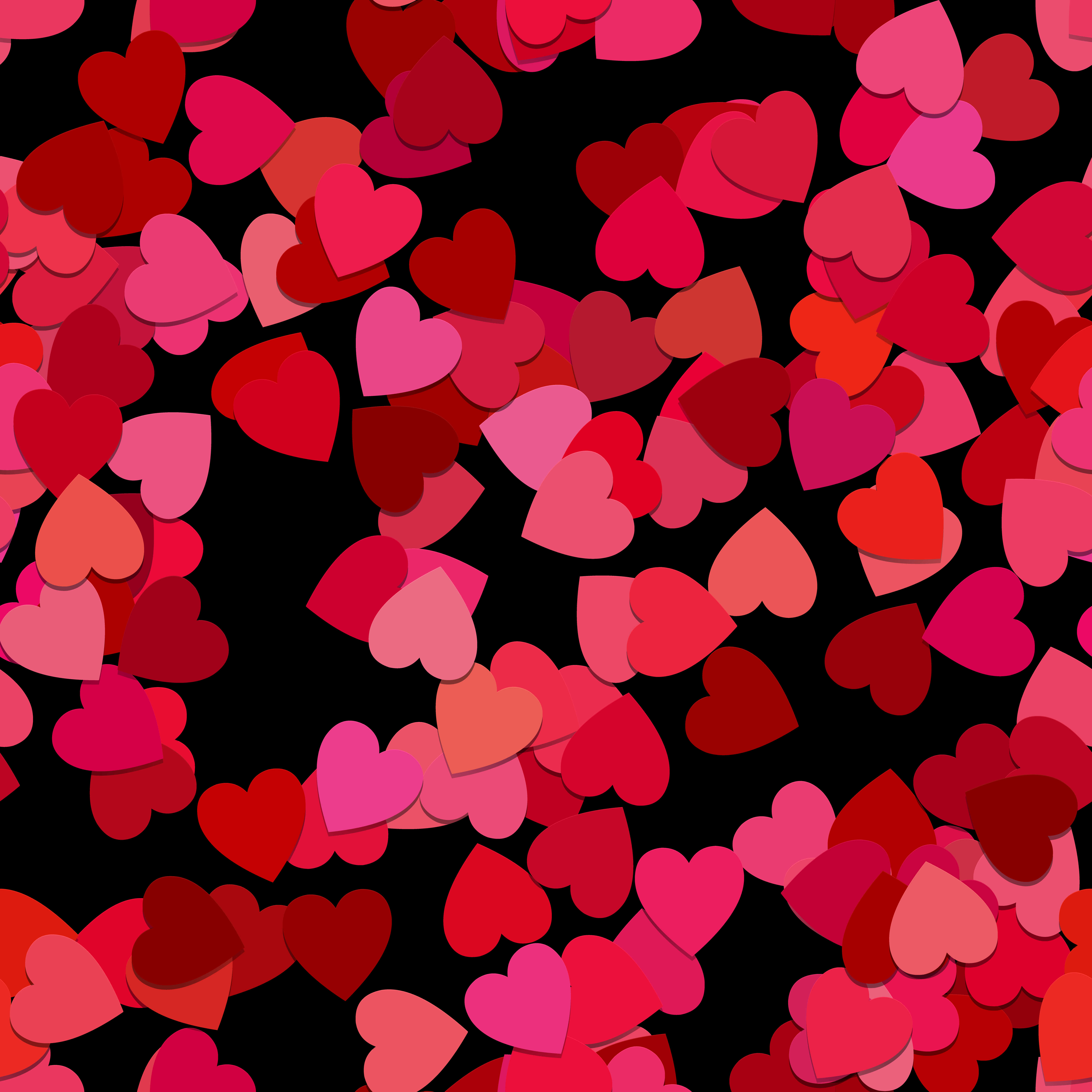 isang pattern na hugis puso na kulay pula at rosas Wallpaper