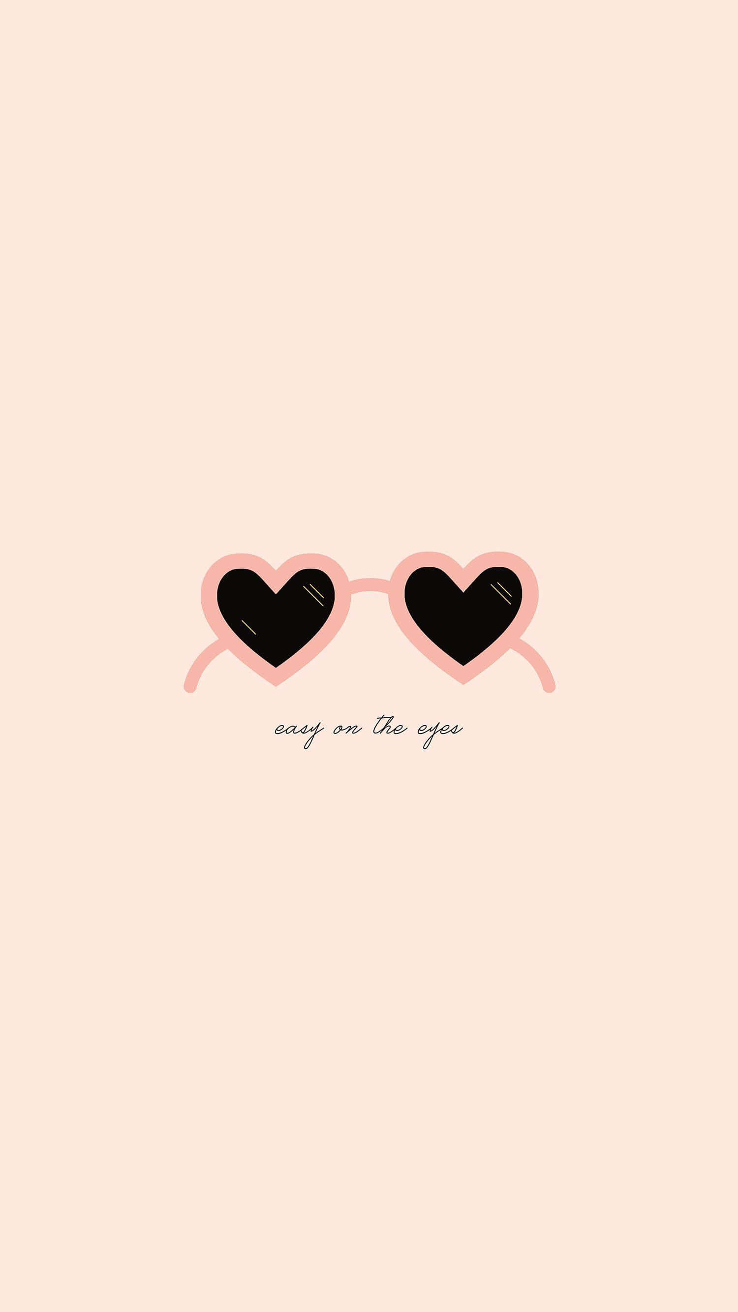 isang pink at itim na salaming pang-araw na hugis puso sa beige na background Wallpaper