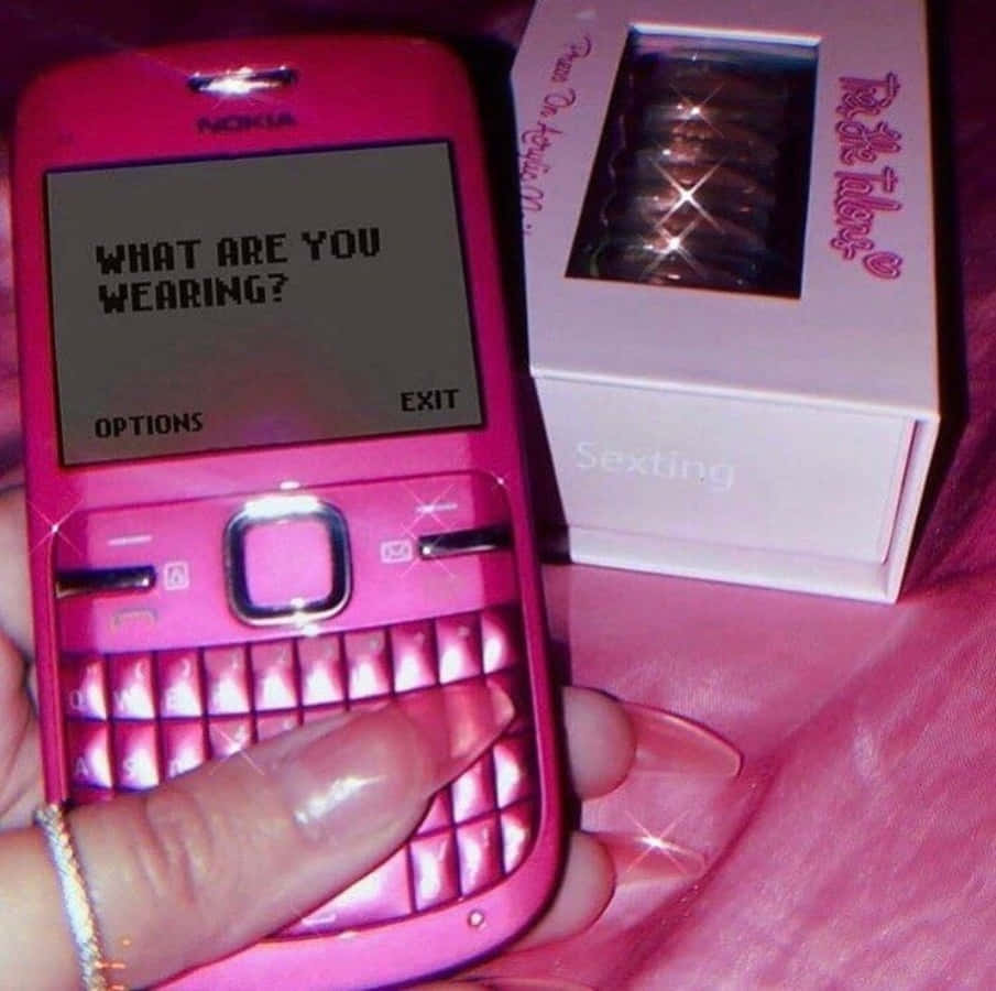 isang pink na cellphone na may mensahe dito Wallpaper