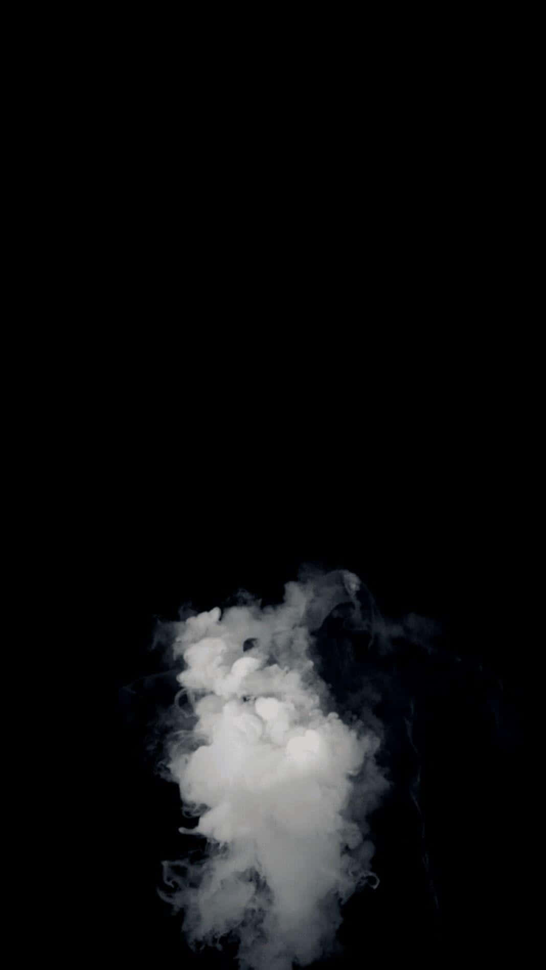 isang puting ulap na lumulutang sa himpapawid Wallpaper