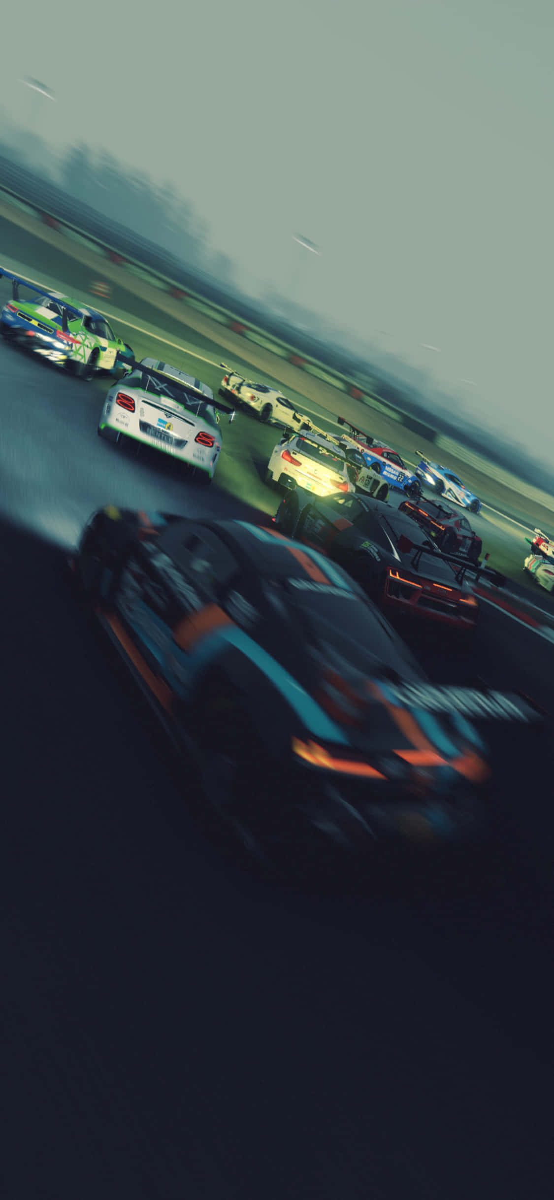 isang race car na bumibisita sa isang track Wallpaper