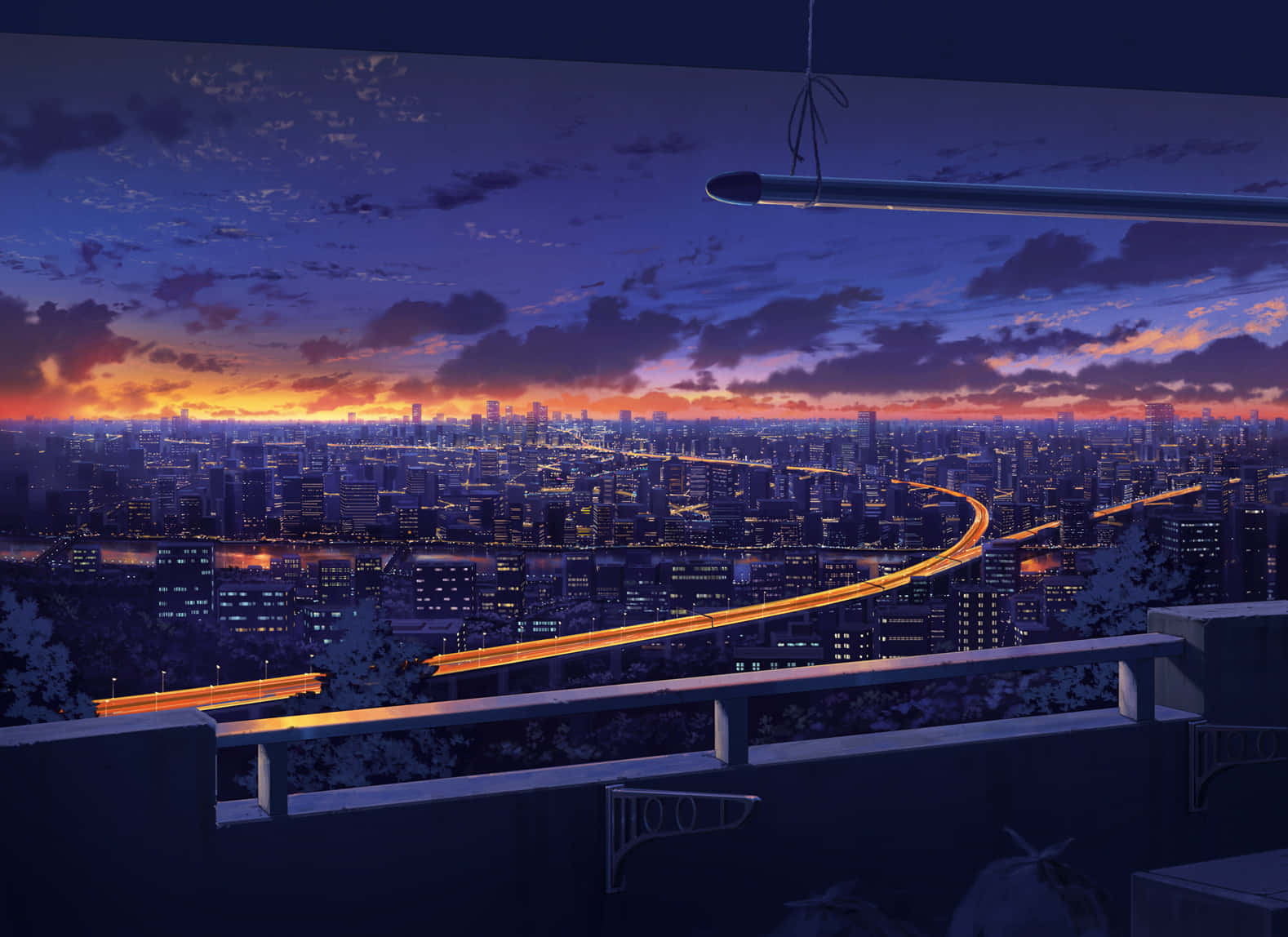 isang tanawin ng lungsod na may tren sa riles Wallpaper