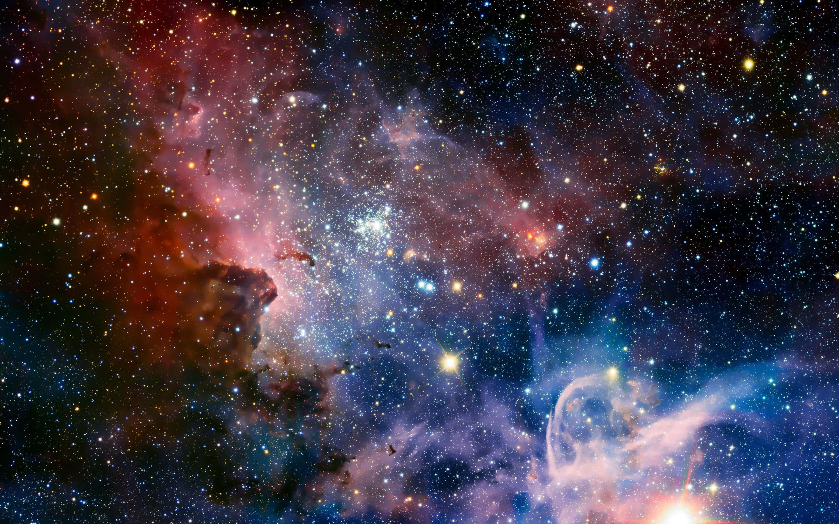 isang tanawin ng nebula kasama ang mga bituin at nebula Wallpaper