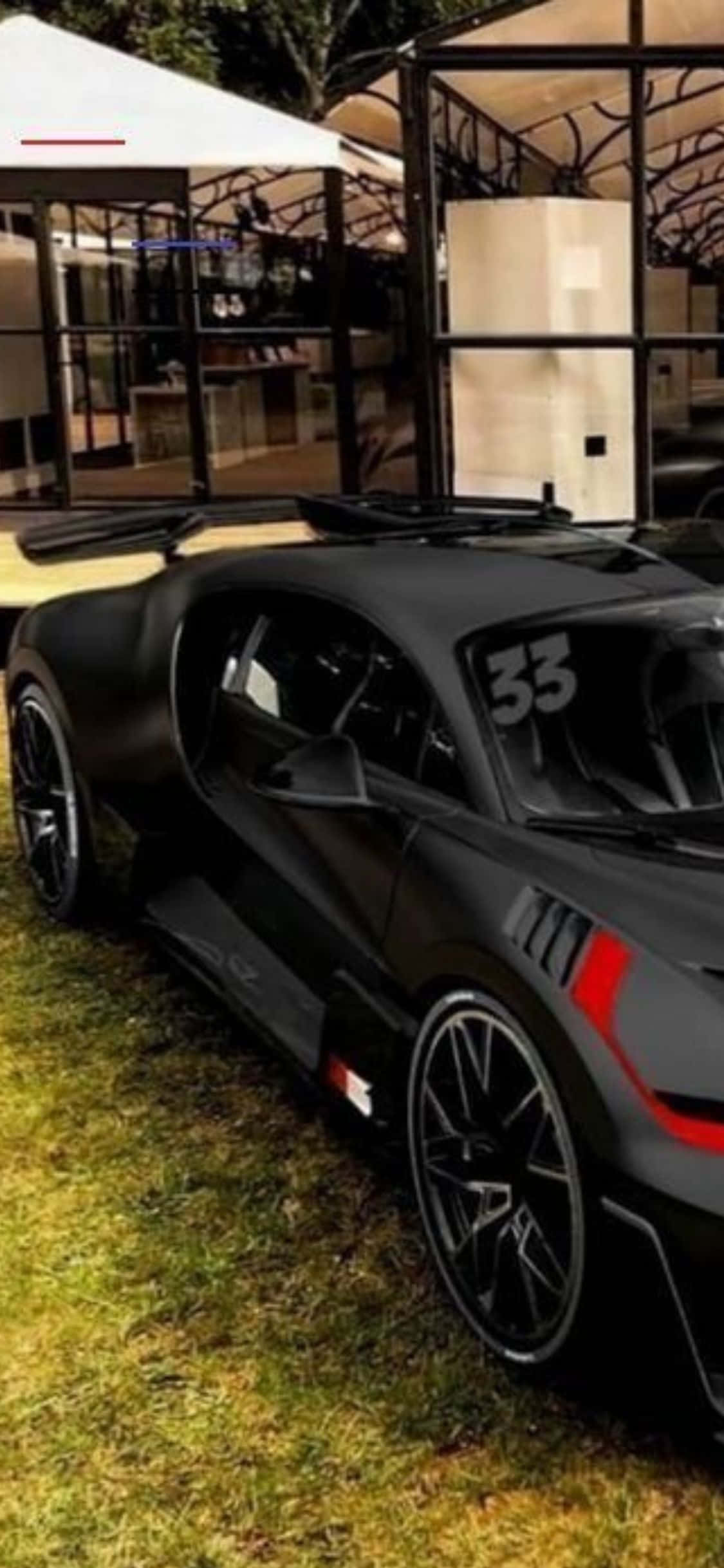 Itaas ang bar na may iPhone Xs at Bugatti Wallpaper
