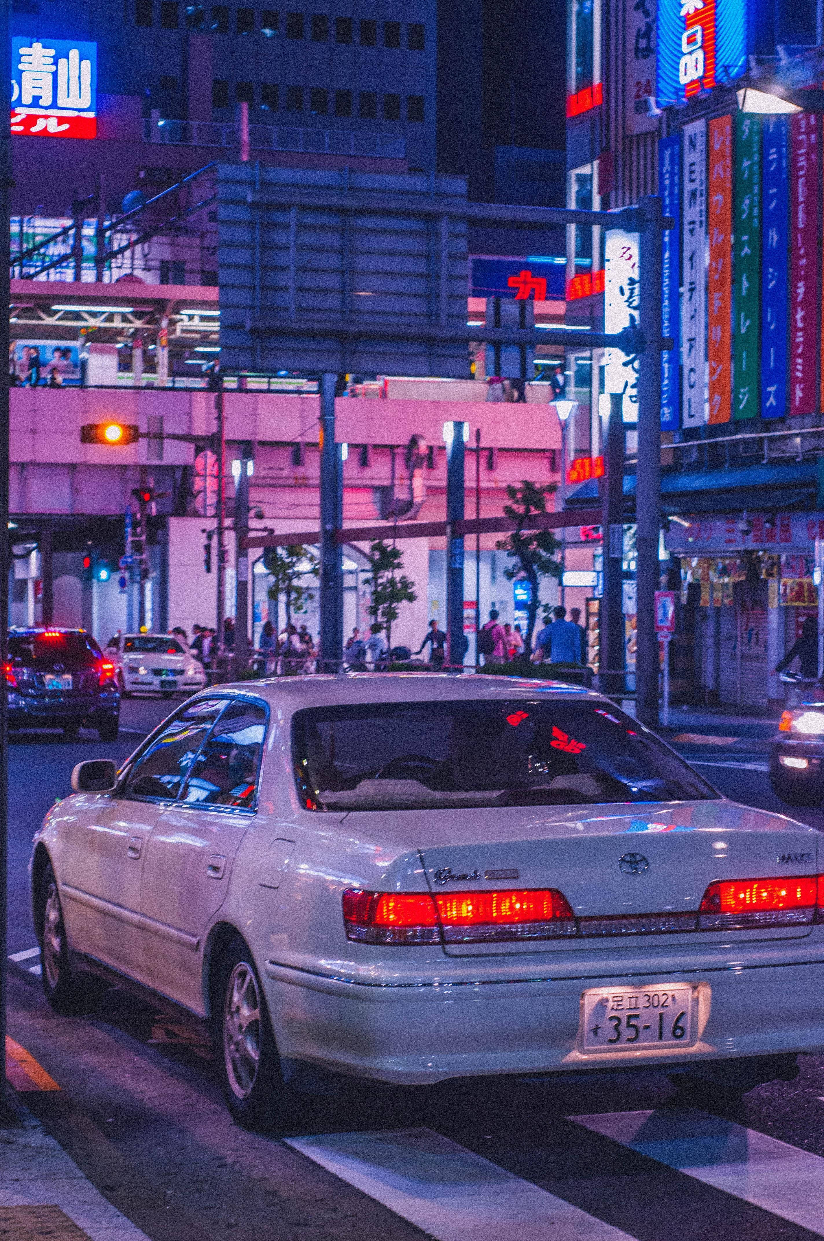JDM Kotse sa Mistulang Gabing Lungsod Wallpaper