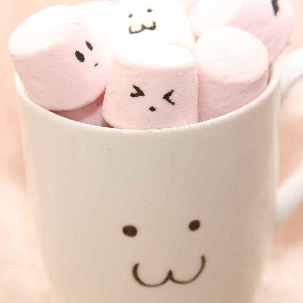 Kaakit-akit na iPad Background na Nagtatampok ng Marshmallow sa Loob ng Tasa Wallpaper