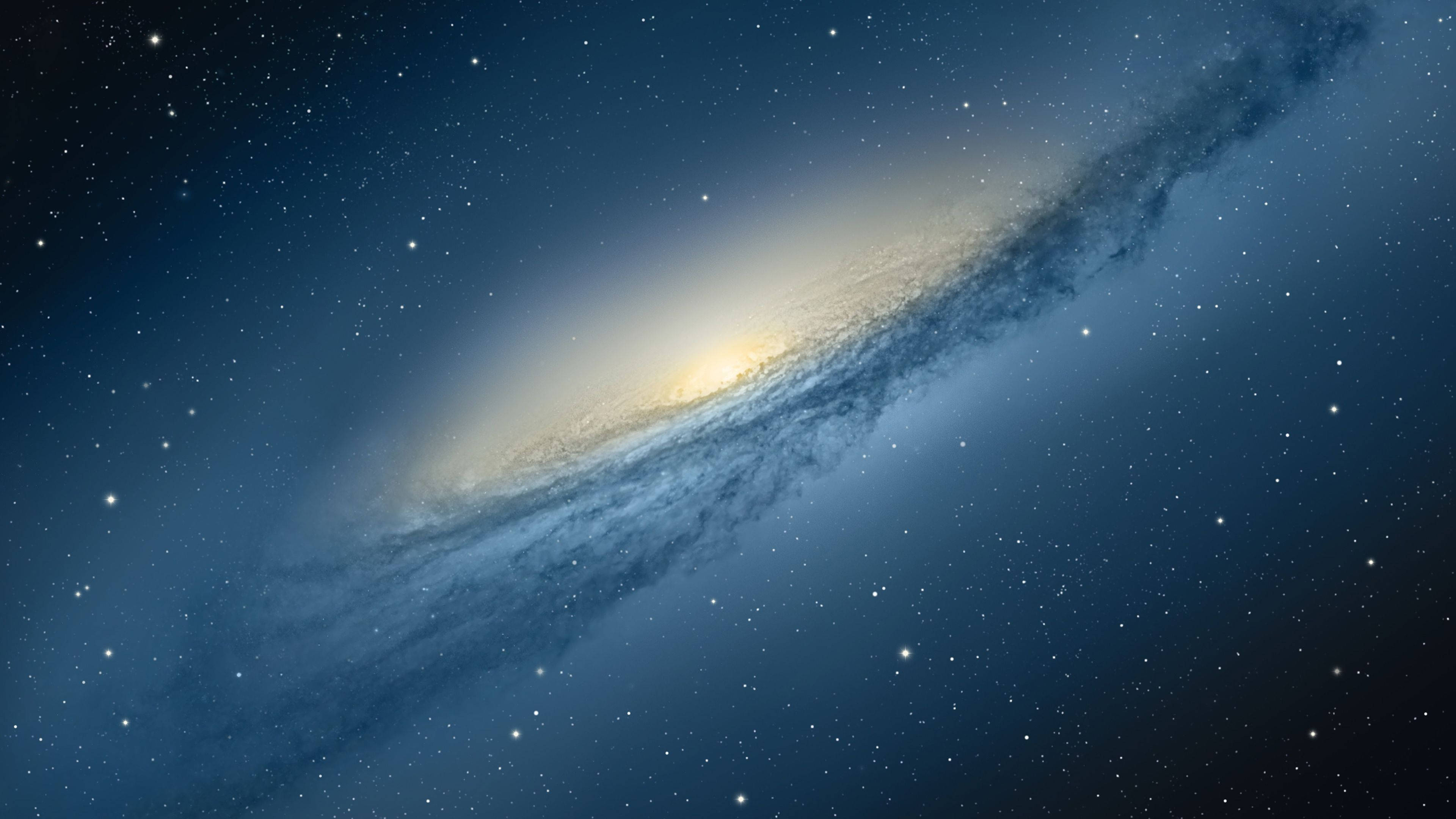 Kalawakan at ang Puting Core ng Isang Galaxy Wallpaper