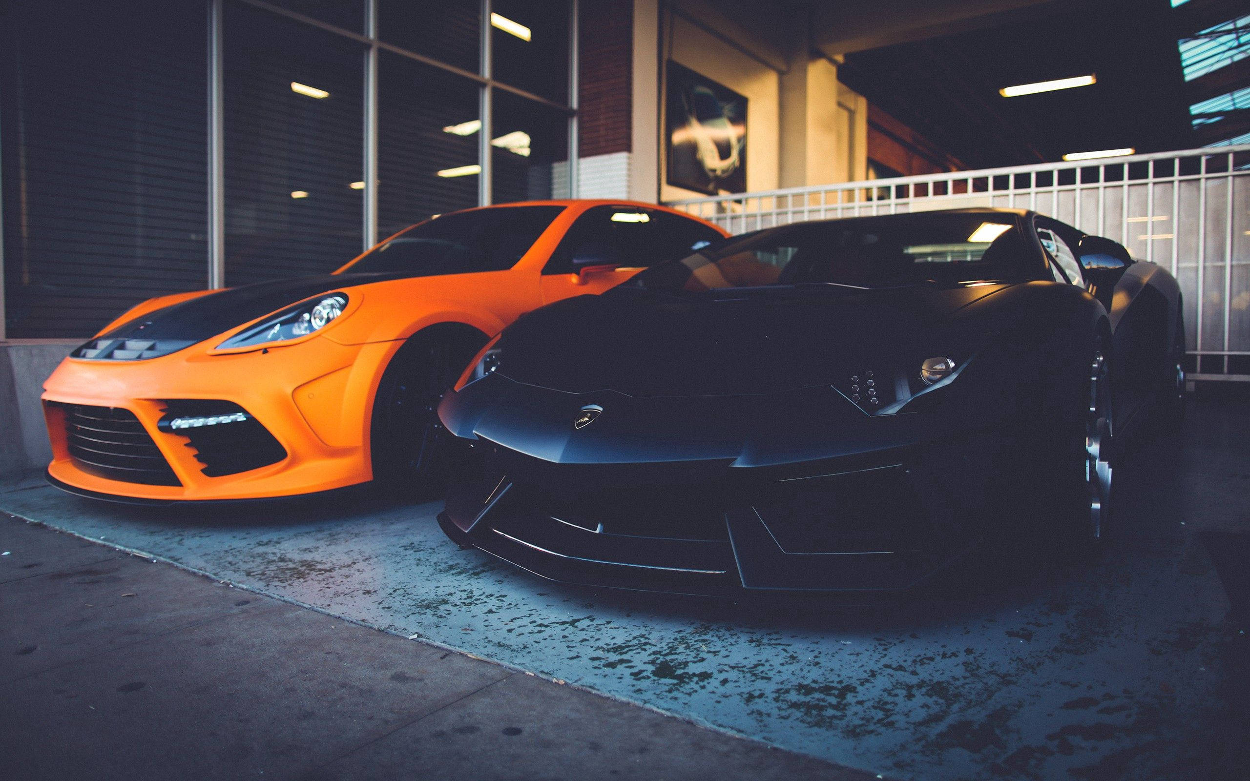 Kapangyarihan at Estilo - Dalawang Luxury Lamborghini Wallpaper