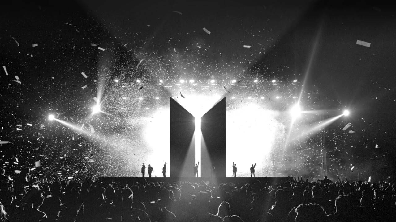 Konsiyerto ng BTS na may Silhouette ng Logo ng BTS Wallpaper