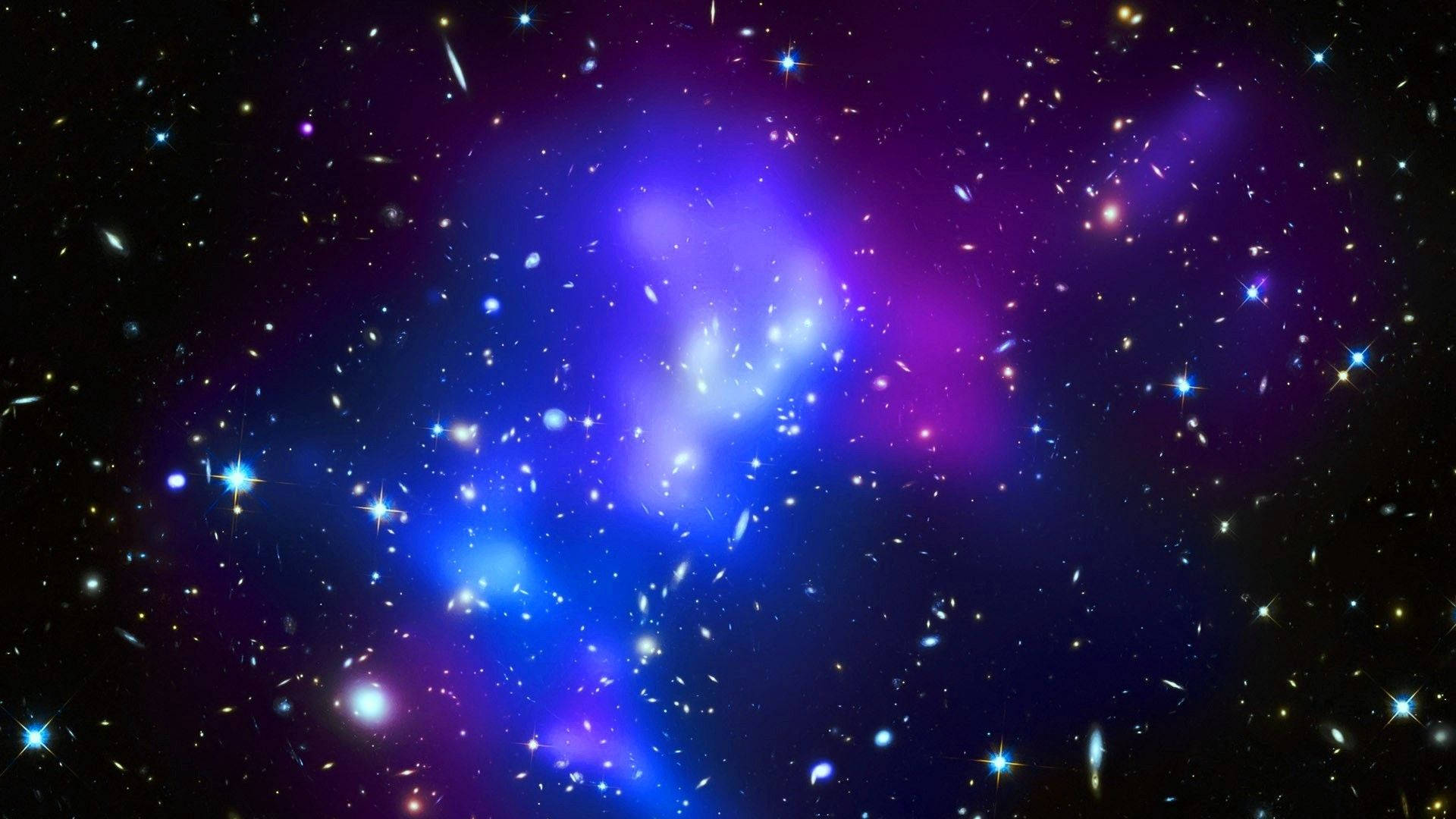 Kumikislap na mga Bituin sa Isang Nakatutuwang Galaxy Wallpaper