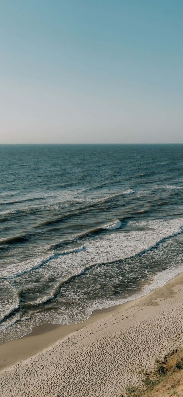 Larawang Likas na Tanawin ng Asul na Dagat Wallpaper