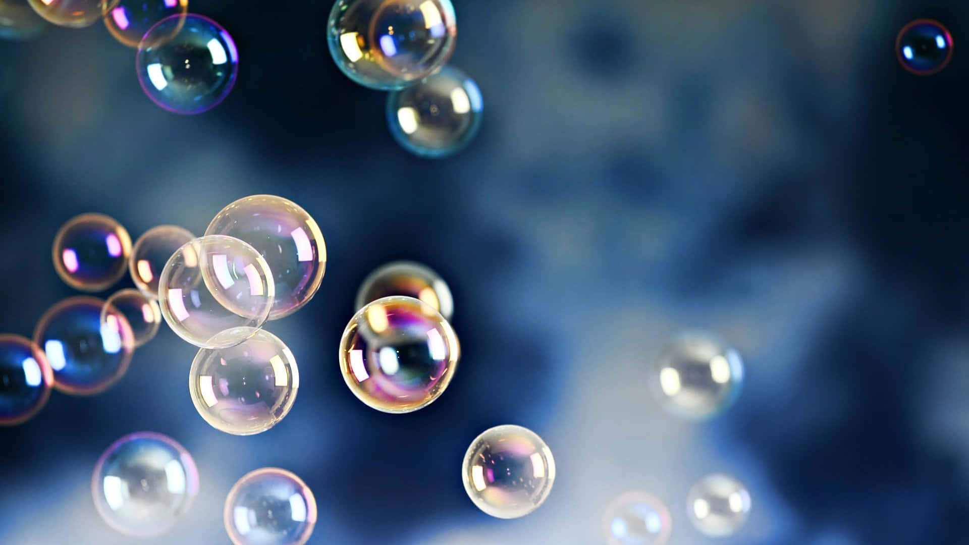 Larawang Tanawin na may Rainbow Bubbles sa Madilim na Asul na Background Wallpaper