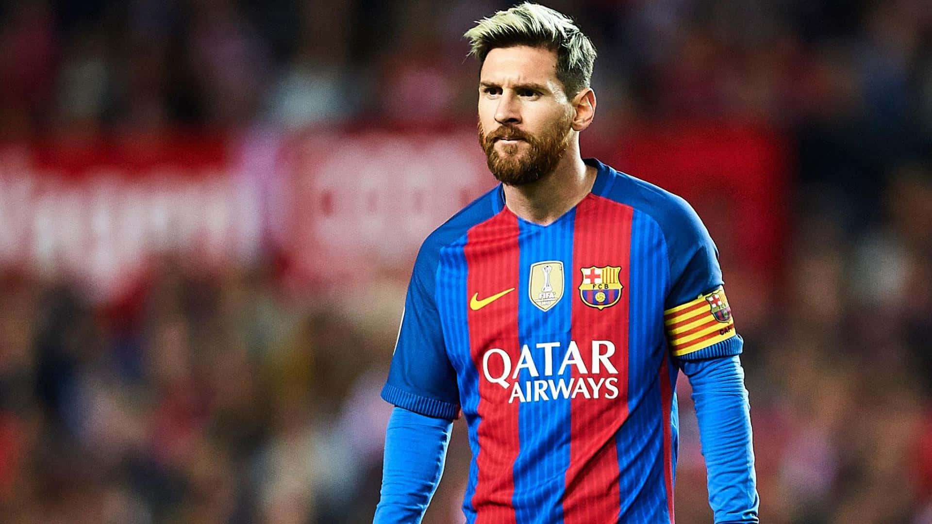Lionel Messi, Kapitan ng FC Barcelona, sa isang nakamamang aksyon na kuha. Wallpaper