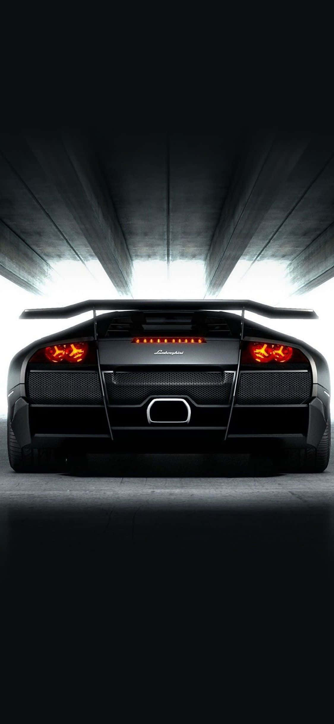 Luho na karanasan - mag-ari ng Black Lamborghini smartphone Wallpaper