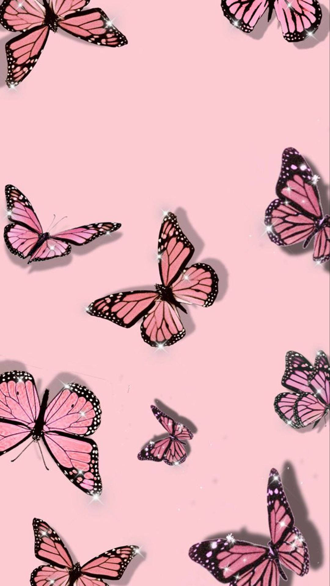 Lumilipad na mga Paru-paro sa Aesthetic Pink Wallpaper