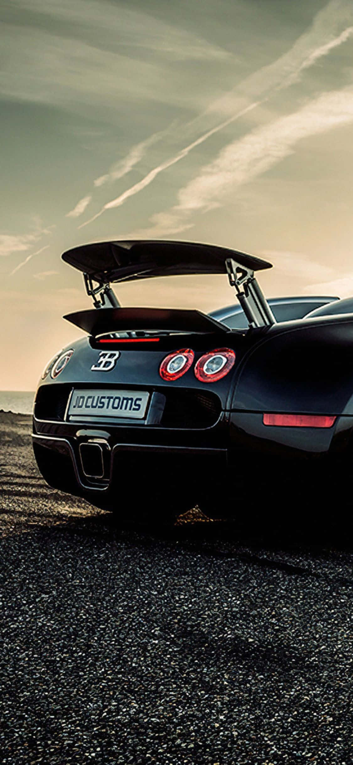 Luxury Sports Car at iPhone Xs Wallpaper