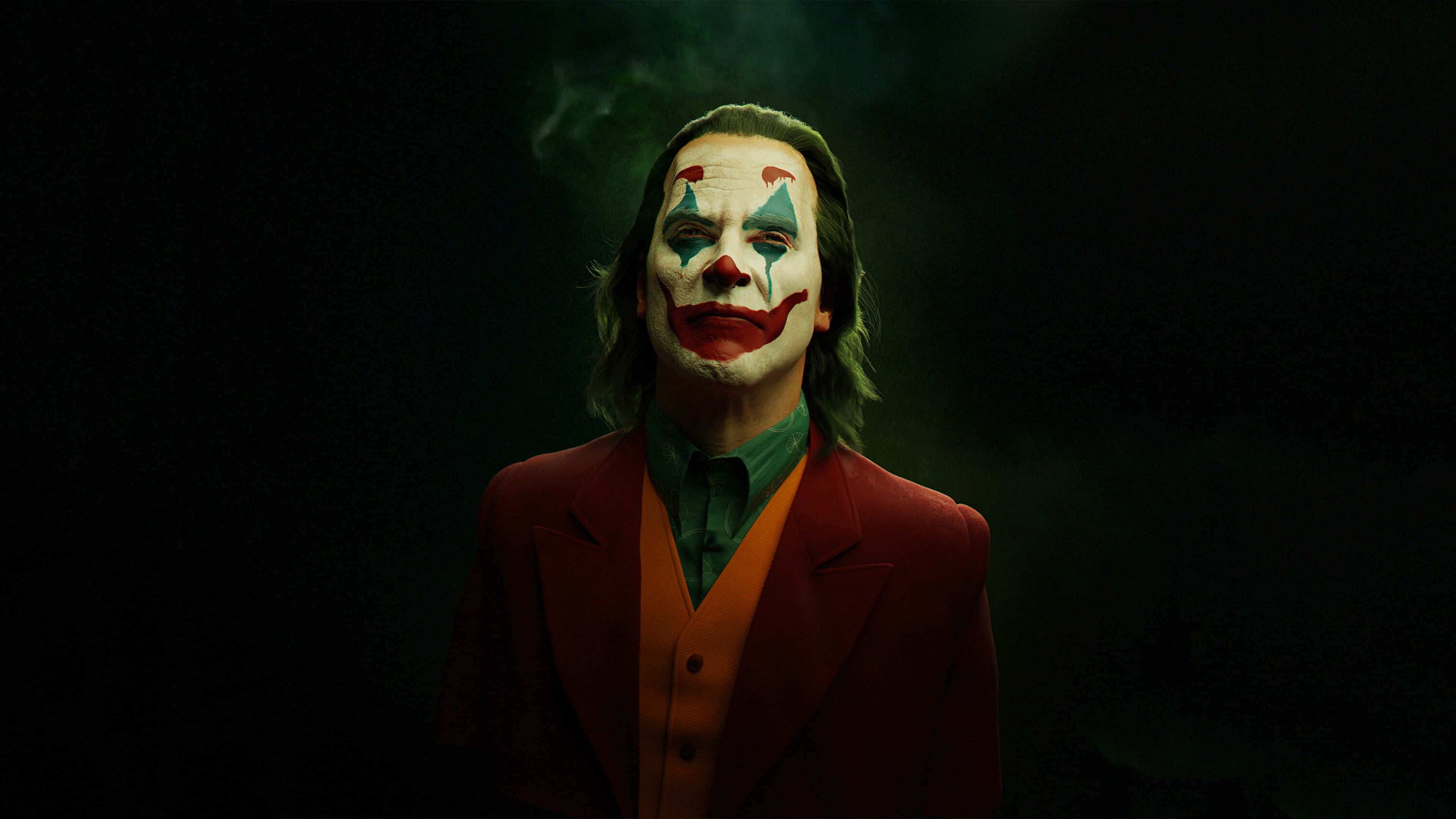 Mahiwagang Joker sa Ilalim ng Spotlight Wallpaper