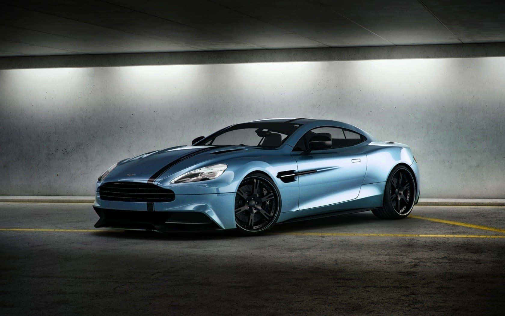 Makinis na Aston Martin Vanquish na Gumagalaw Wallpaper