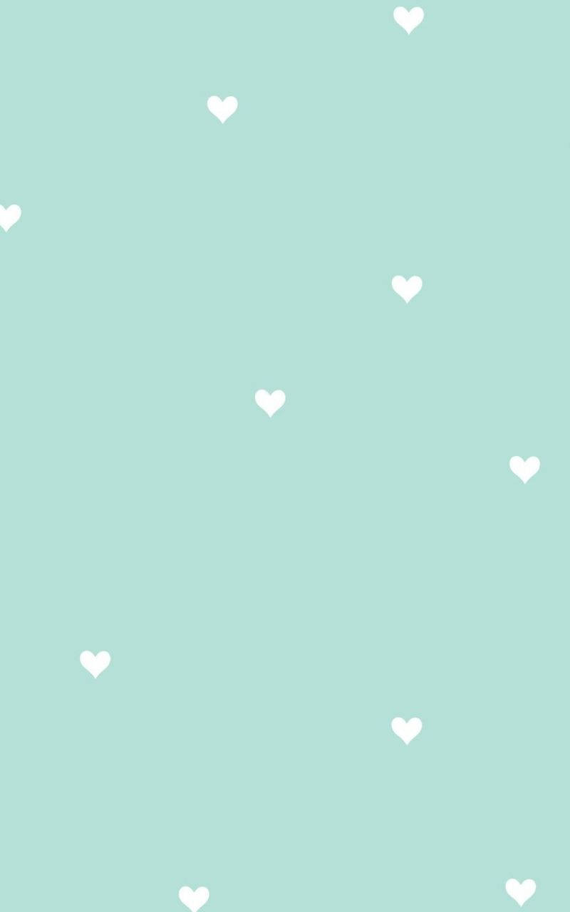 Maliit na Puting Puso sa Light Green na Aesthetic Wallpaper