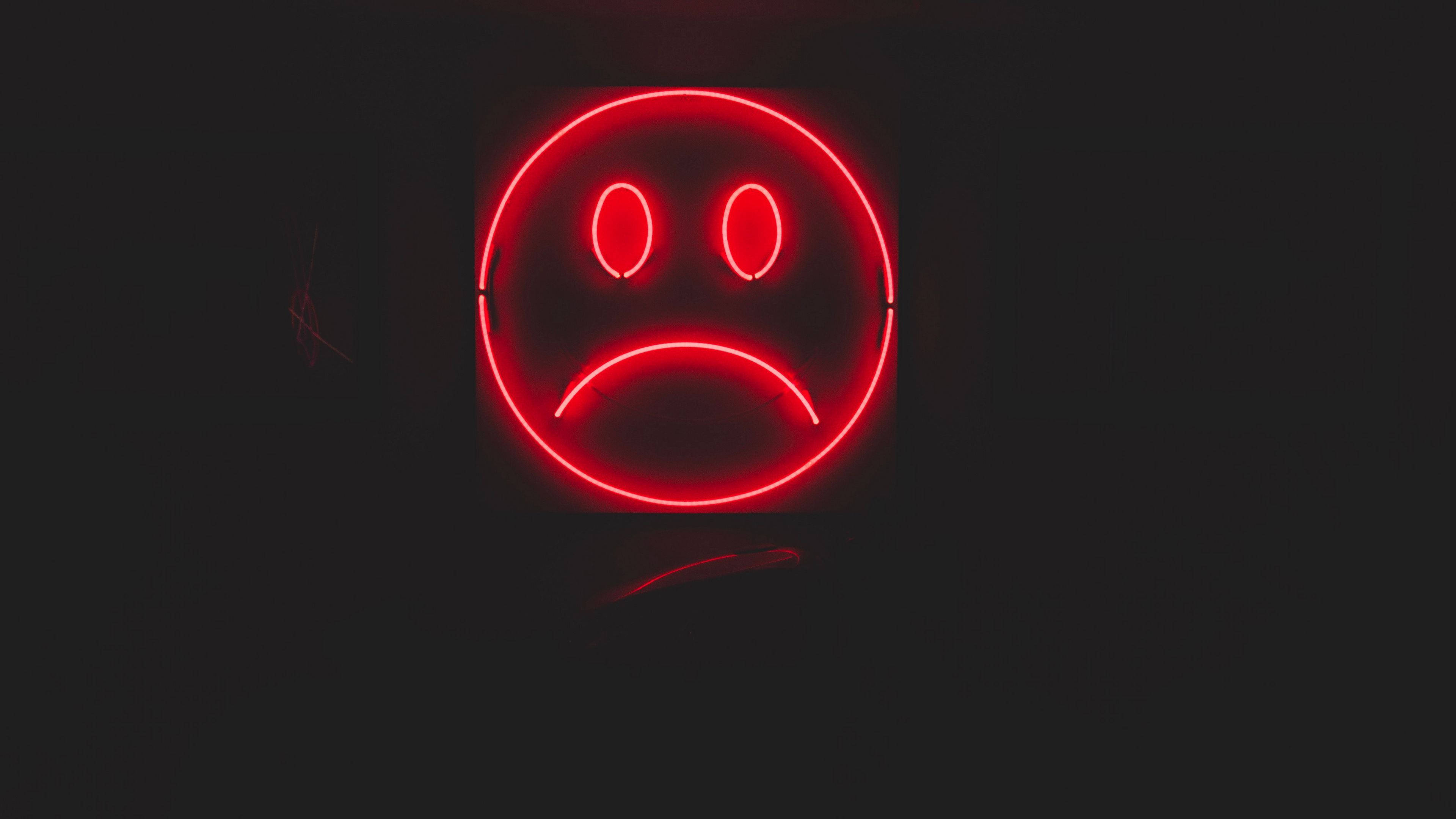 Malungkot na Red Emoji 4K Wallpaper
