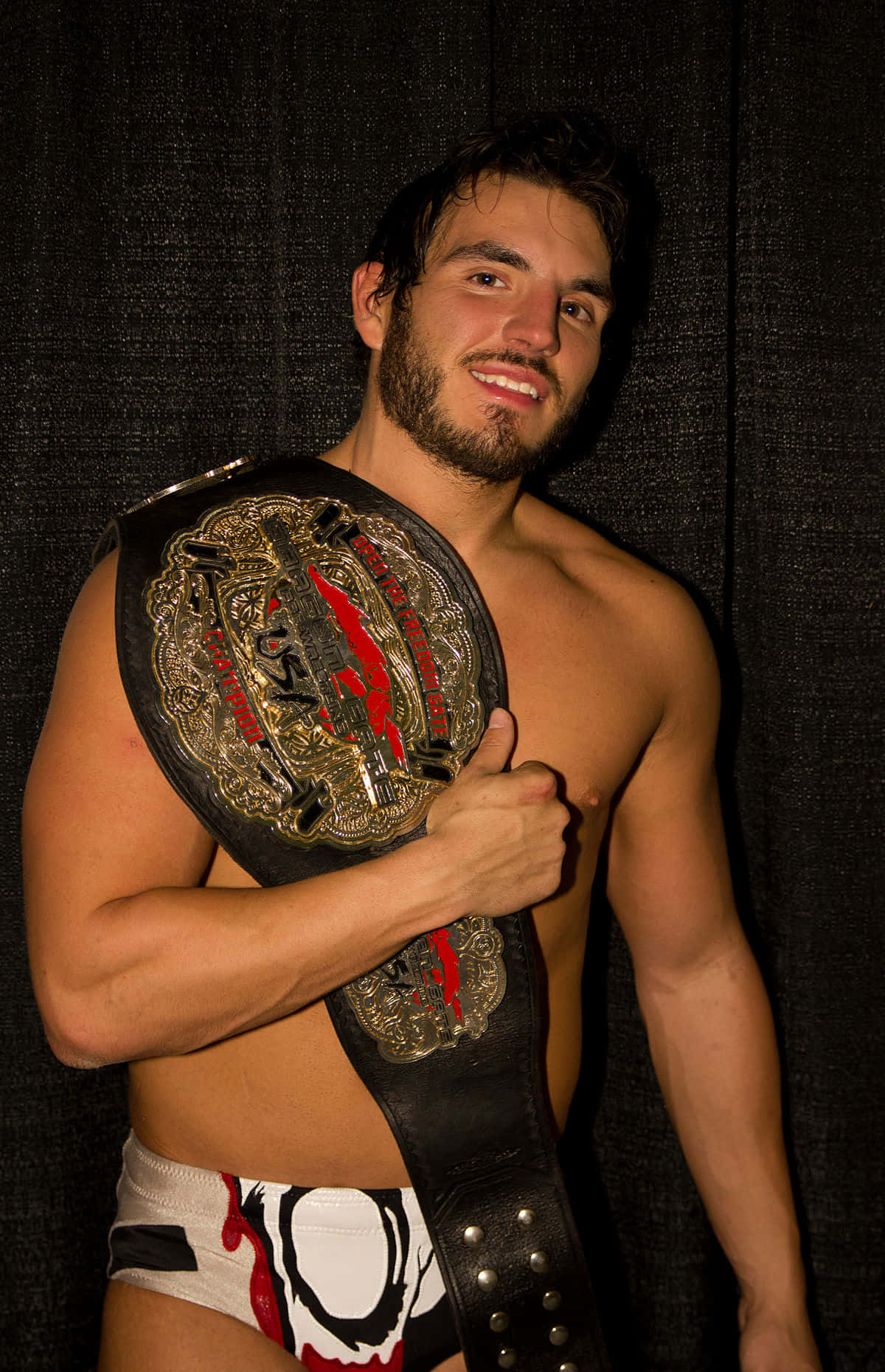 Manlalaban na si Johnny Gargano na May Heavyweight Belt Wallpaper