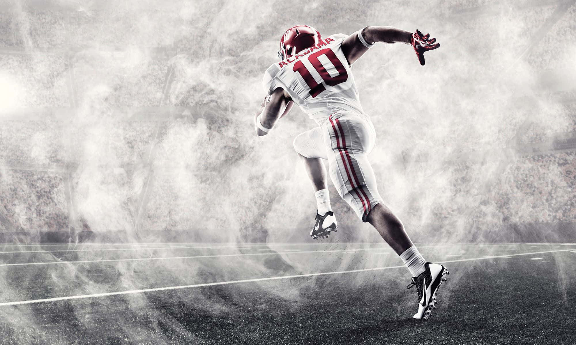 Manlalaro ng Koponan ng Football ng Alabama na Tumatakbo Wallpaper
