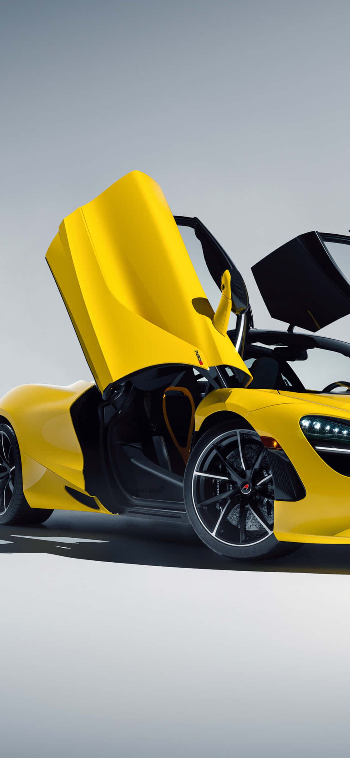 Maramdaman ang perpektong kombinasyon ng karangyaan at mataas na perpormans – ang iPhone XS McLaren 720S Wallpaper