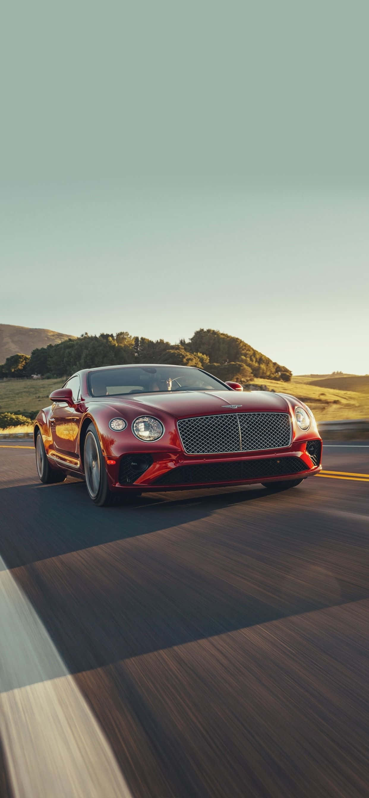 Maranasan ang karangyaan sa makinis na bagong iPhone Xs Max at Bentley. Wallpaper