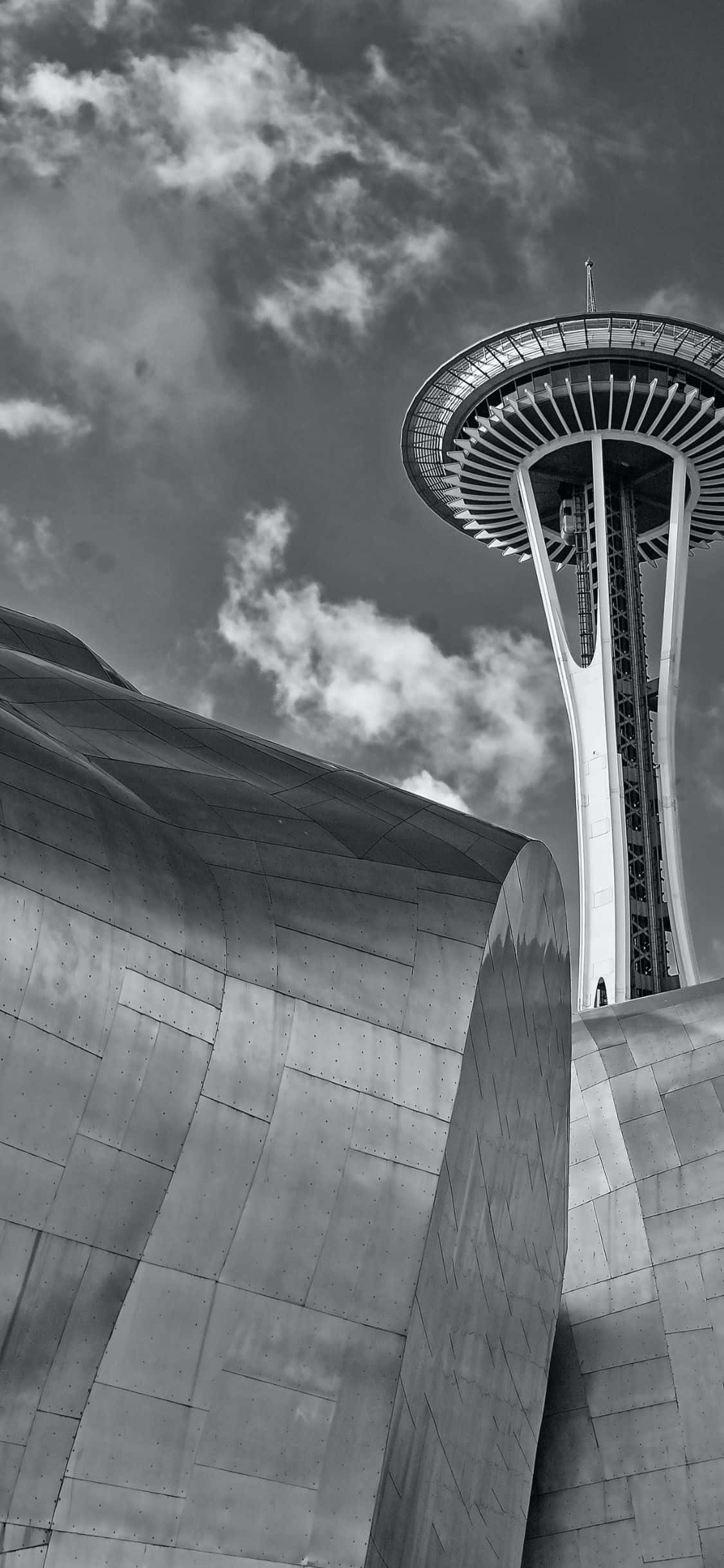 Masaya sa nakakagulat na Seattle skyline at iconic Space Needle sa pamamagitan ng kahanga-hangang display ng iPhone X. Wallpaper