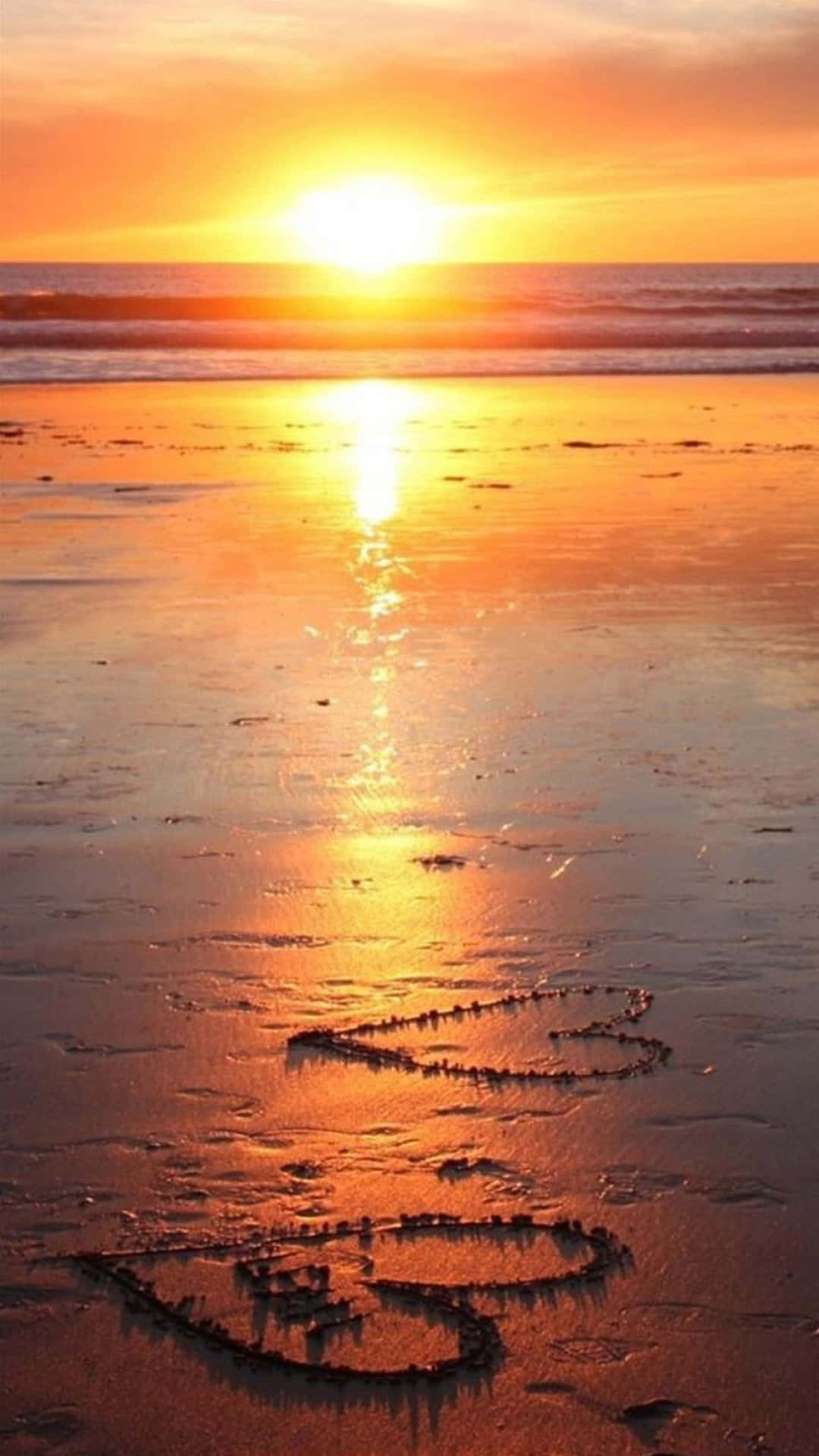 Masiyahan sa Isang Nakakamang Pagsalop sa Dagat Wallpaper