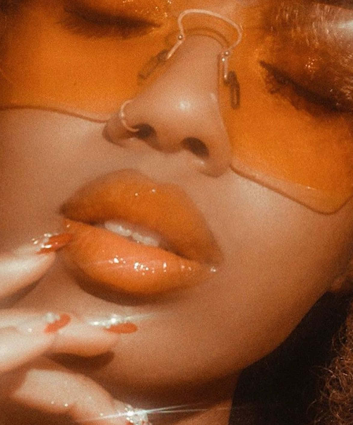 Masiyahan sa makulay na kulay ng kalikasan na may orange aesthetic Wallpaper