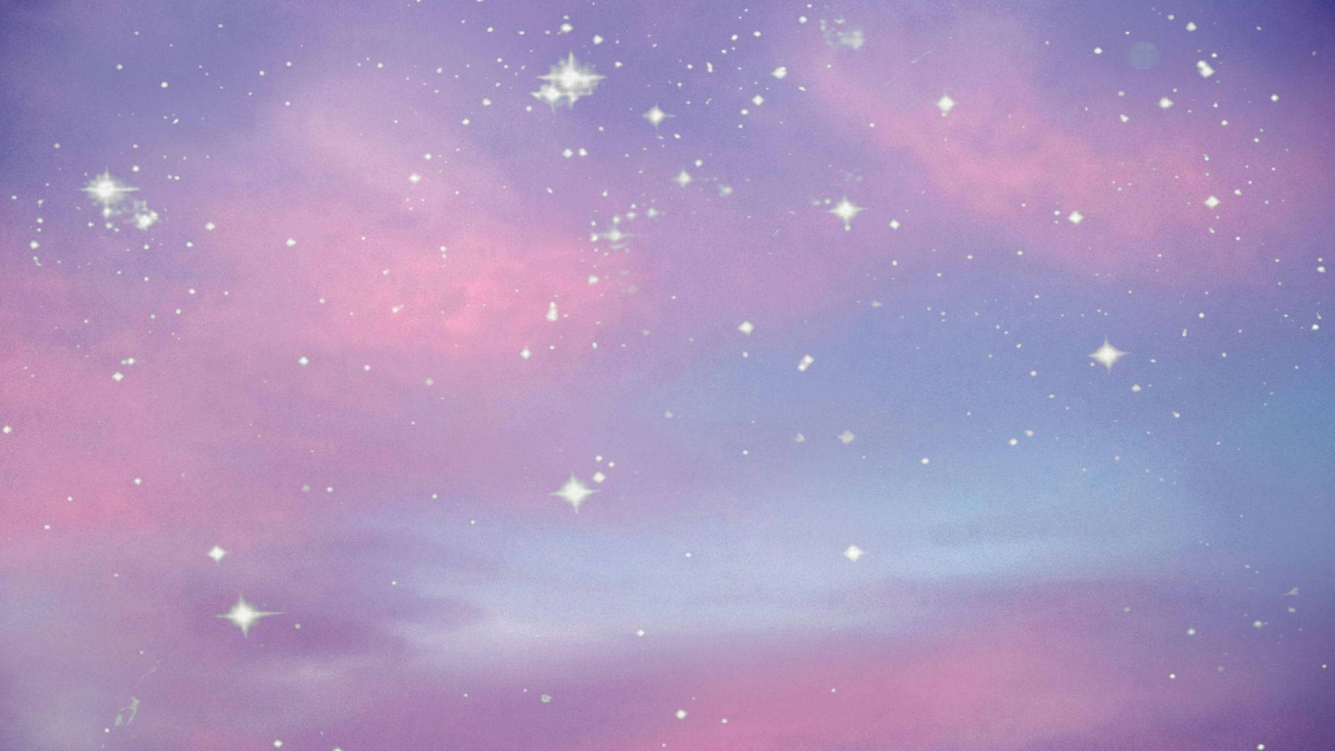 Mga Bituing Kumikislap sa Isang Makatang Galaksiya Wallpaper