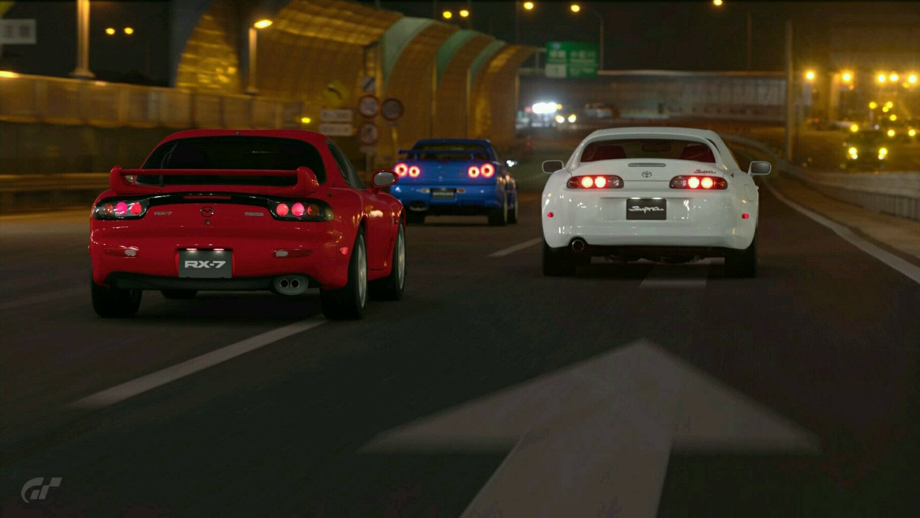 Mga JDM Kotse sa Daan sa Gabi Wallpaper