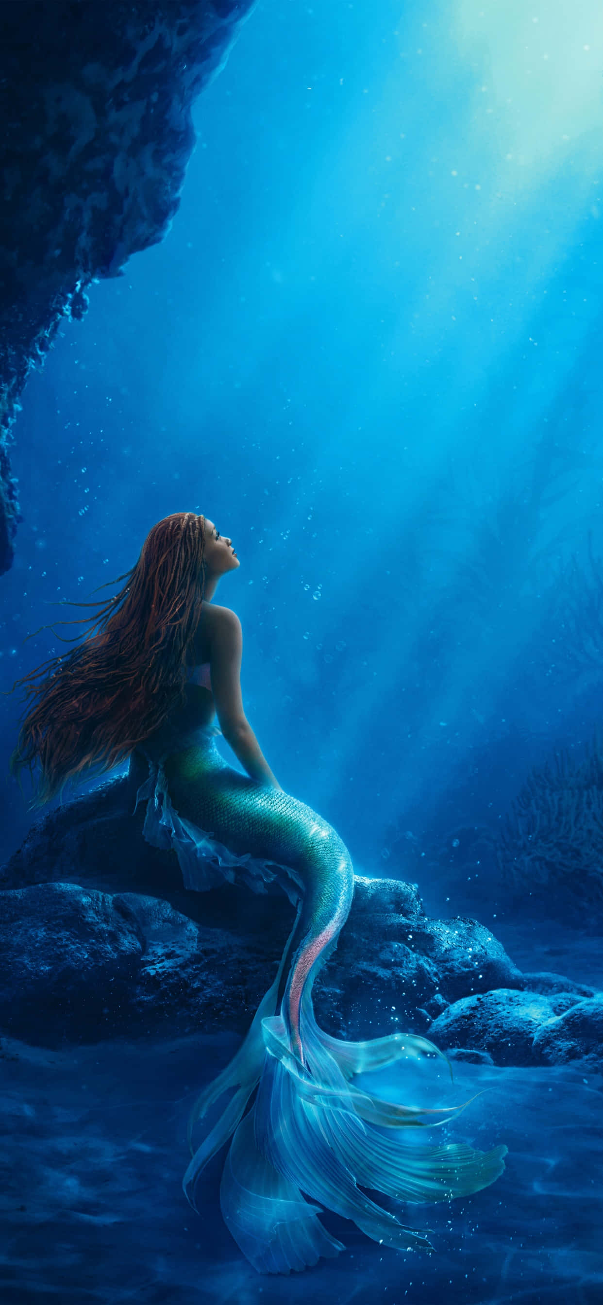 Mystical Mermaid Silhouette Against a Shimmering Moonlit Sea Wallpaper