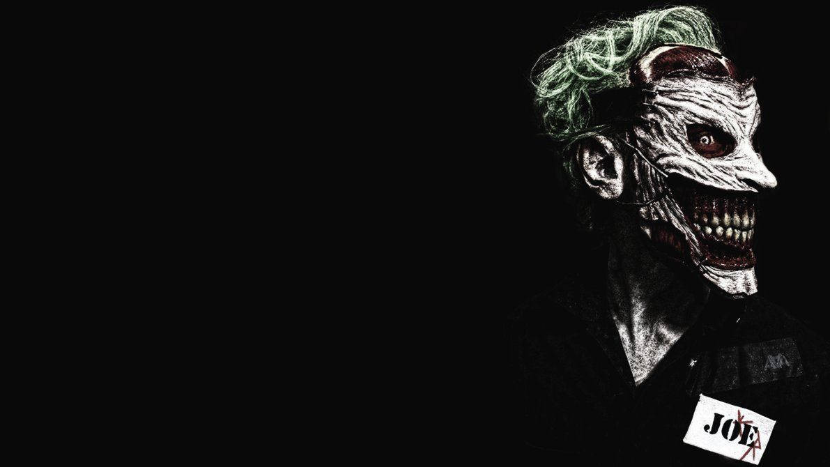 Nabalat na Mukha ng Joker Wallpaper