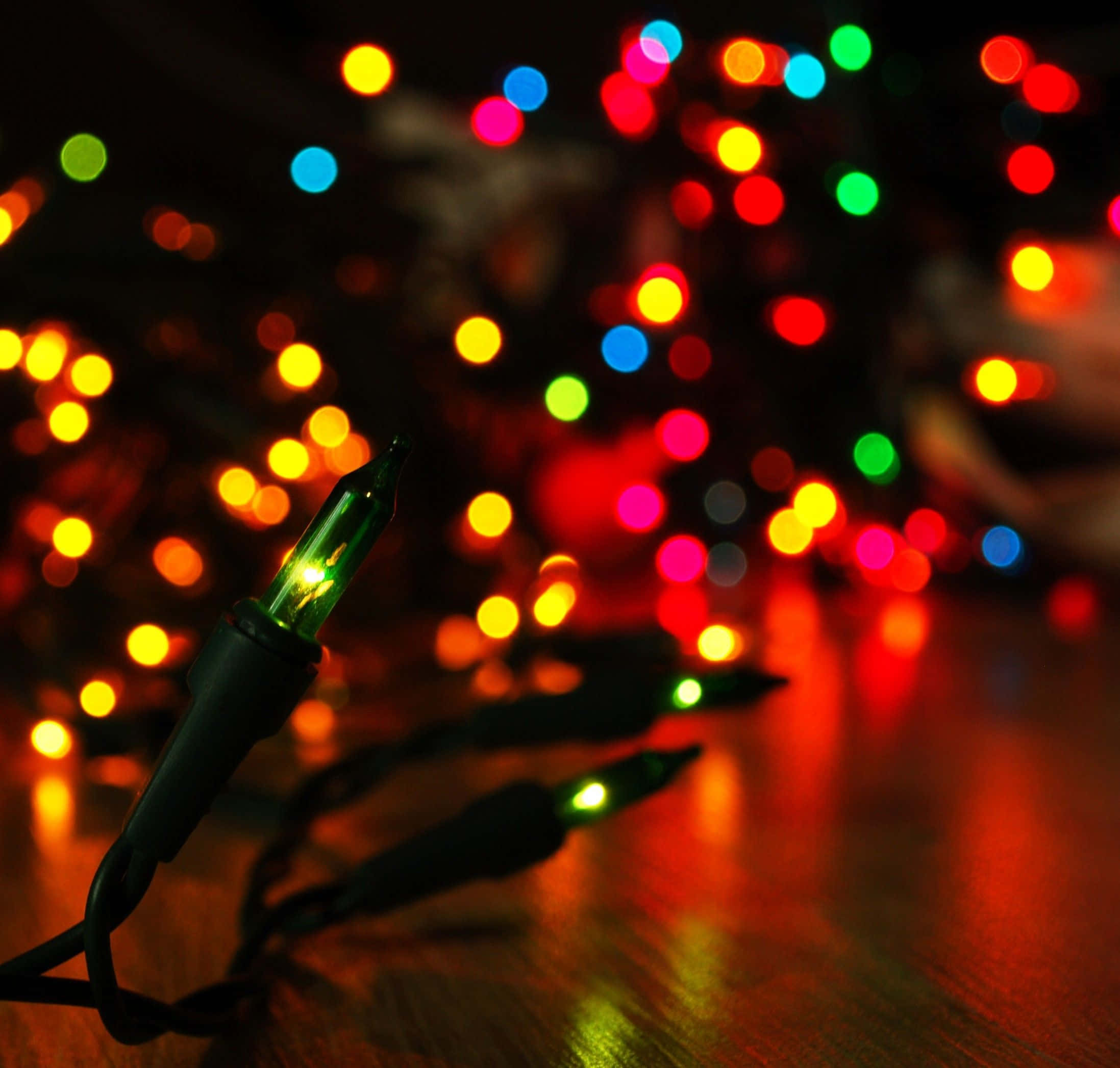 Nakakamang Liwanag ng Mahikang Pasko Wallpaper
