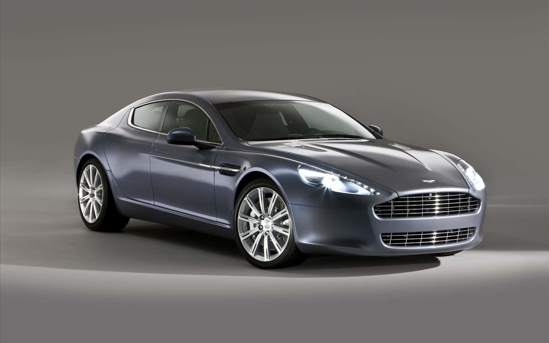 Napakagandang Aston Martin Rapide S sa galaw Wallpaper