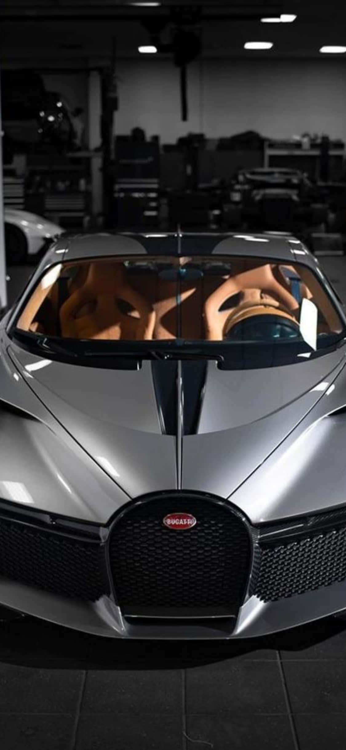 Natatanging karangyan: tuklasin ang mundo gamit ang isang personalisadong iPhone Xs at Bugatti Wallpaper