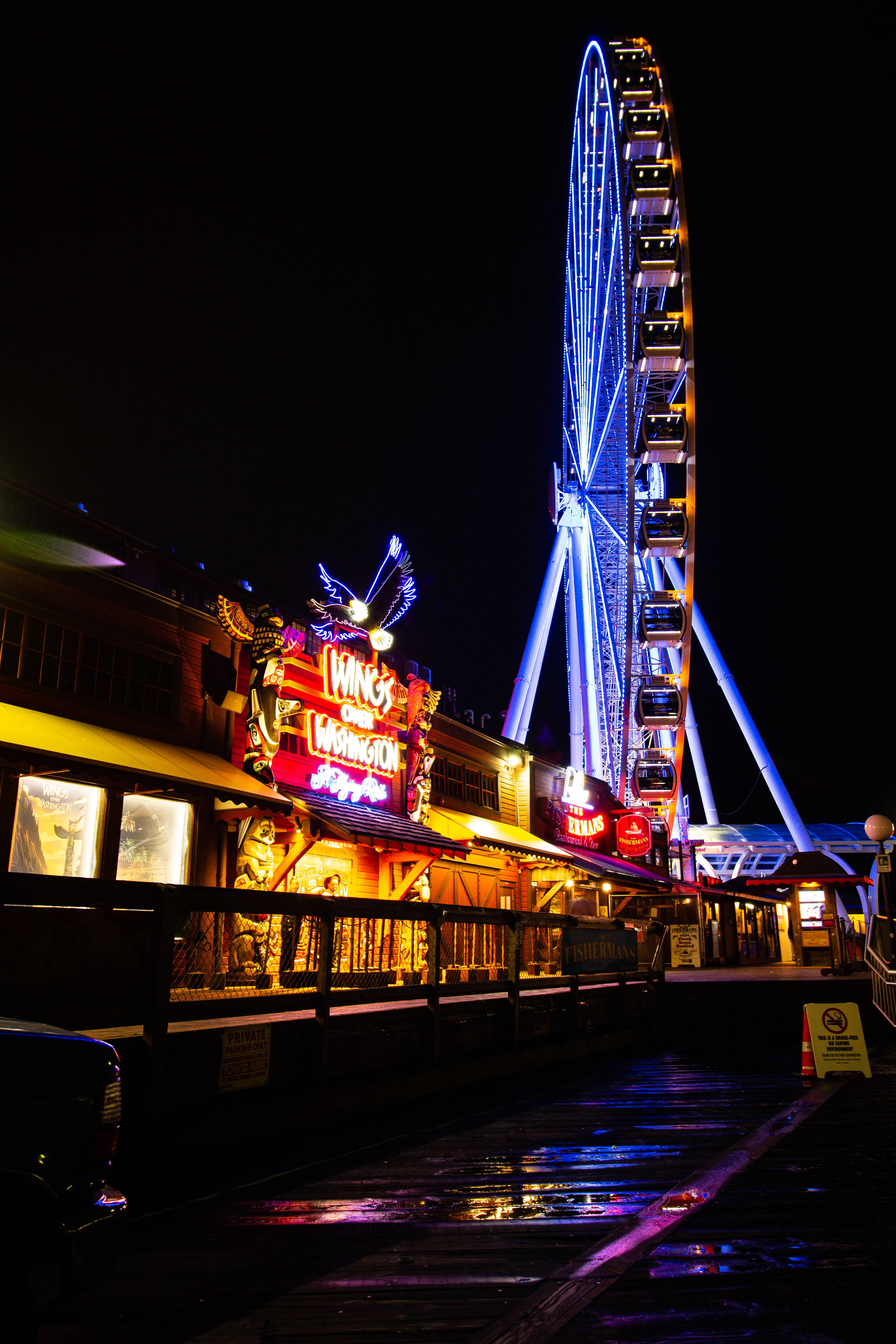 Neon na iPhone ng Amusement Park Wallpaper