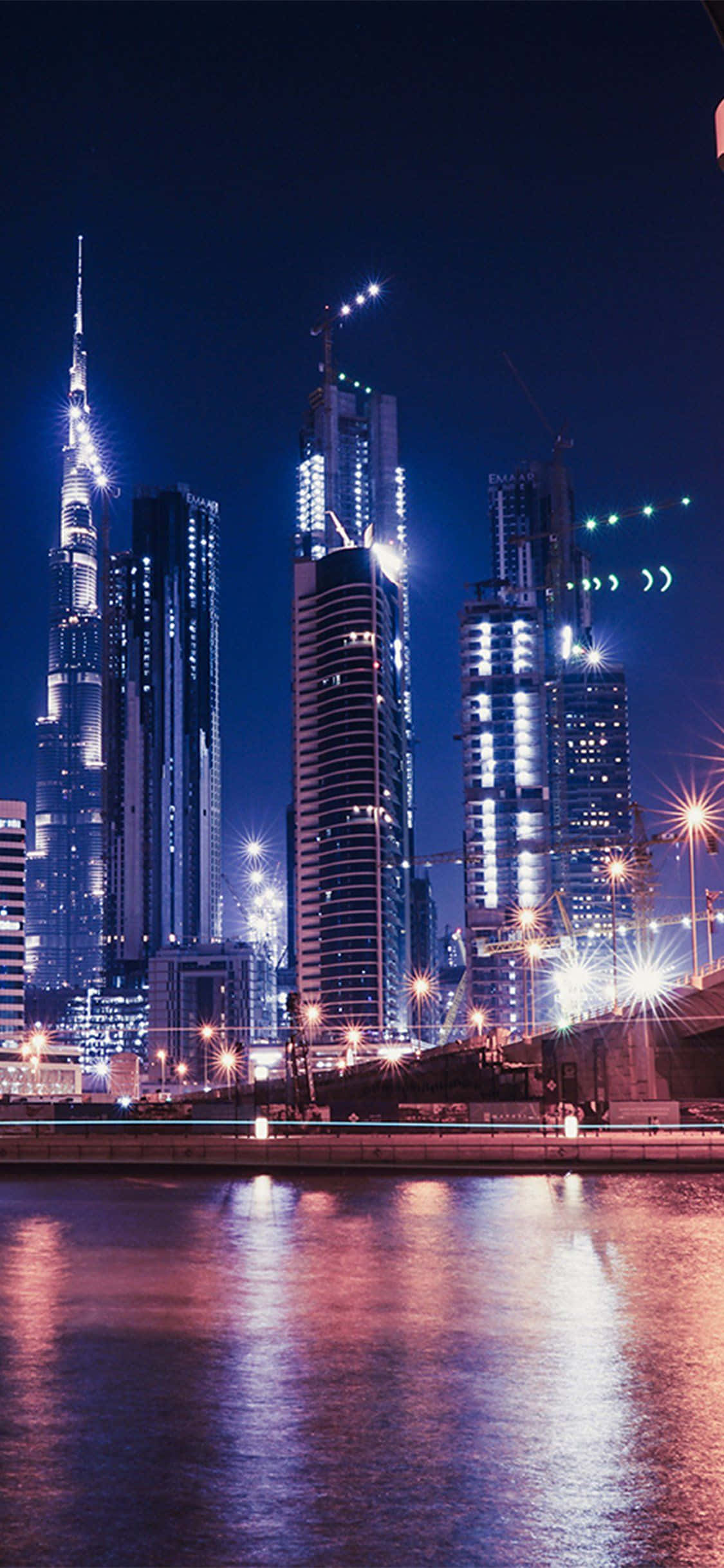 Night View Dubai City iPhone Low Angle Shot Wallpaper