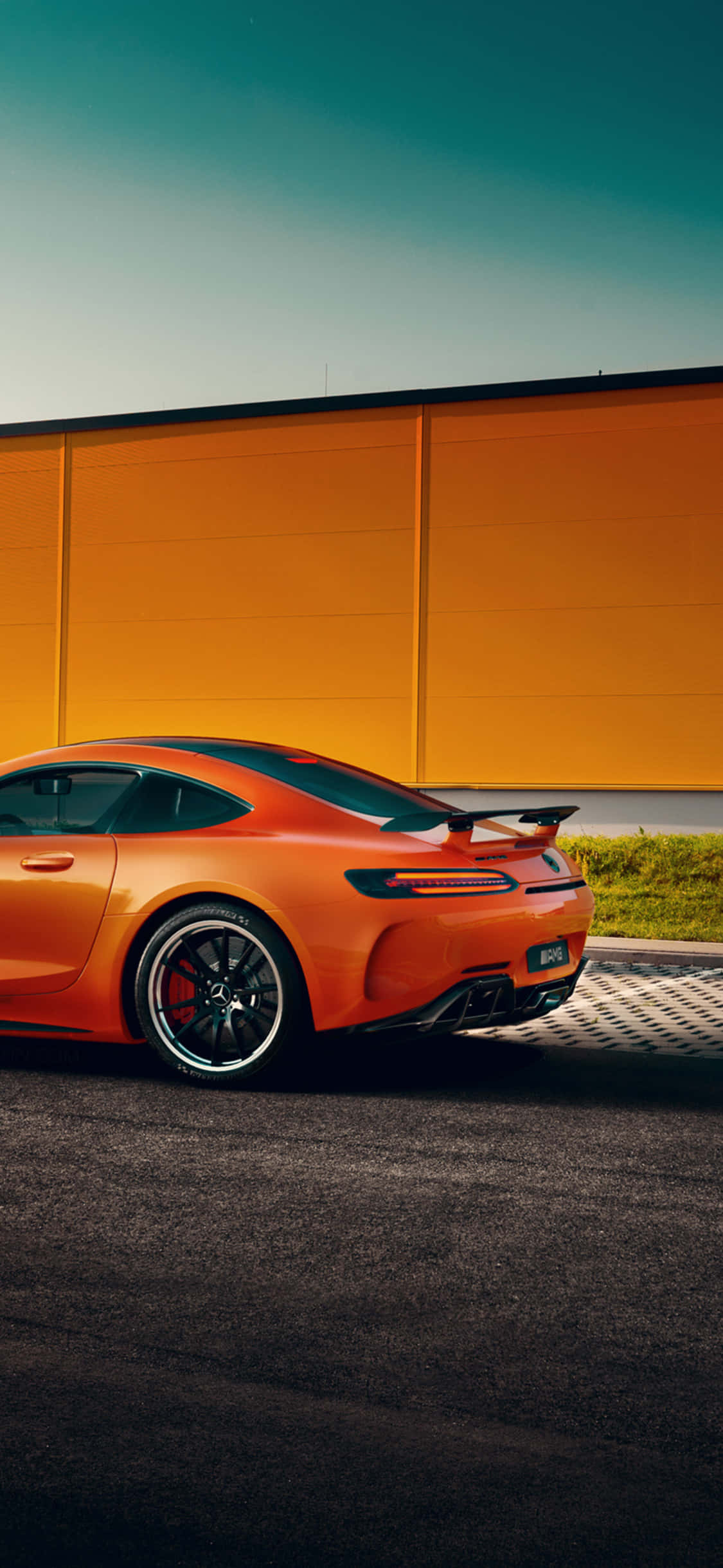 Orange iPhone Xs Mercedes Amg Background Wallpaper