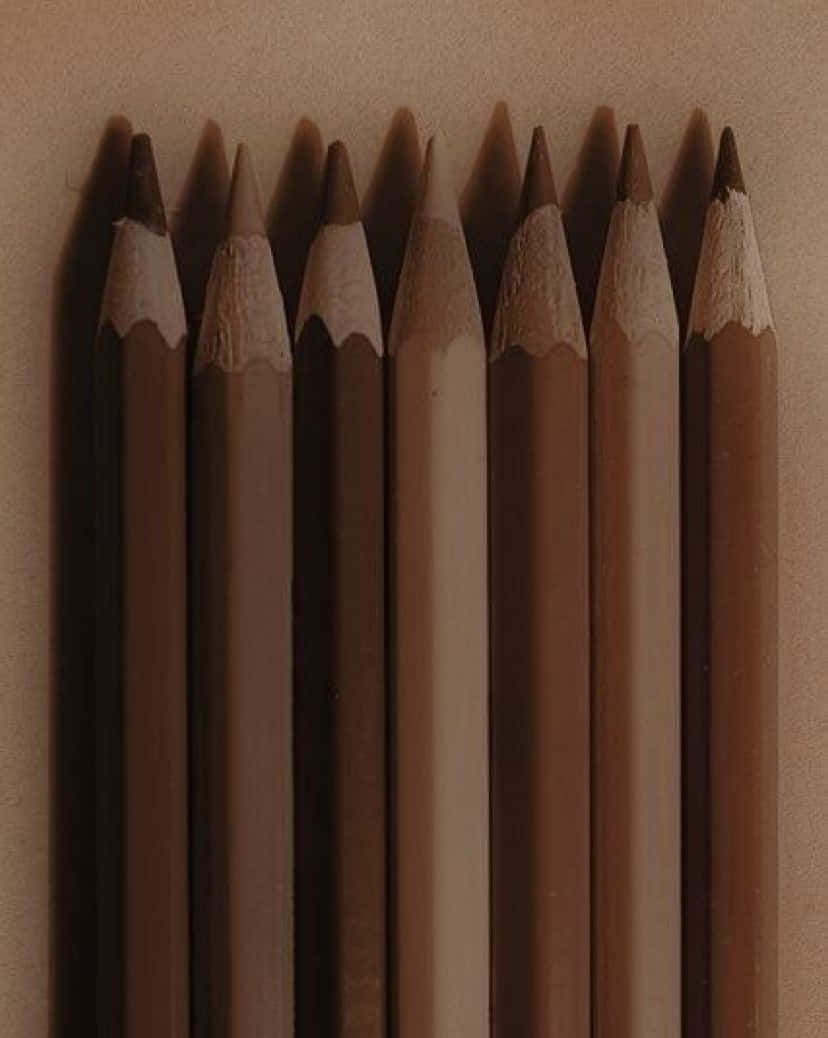 Pagmasdan ang Ganda ng Kalikasan sa Aesthetic Brown na Tanawin Wallpaper