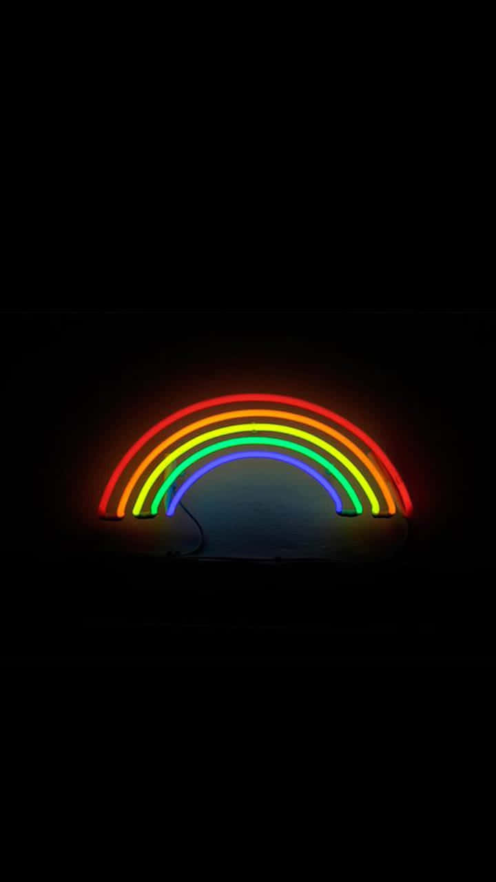Pagyakap sa makulay na kulay - Isang nakakabighibang background na may rainbow aesthetic Wallpaper