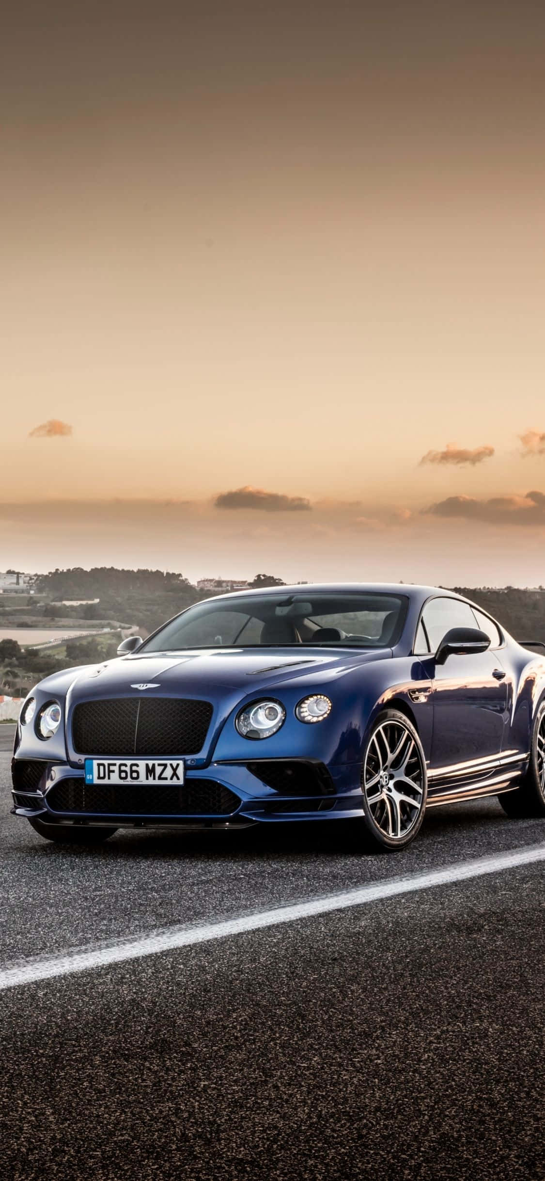 Parked Blue Bentley iPhone Wallpaper