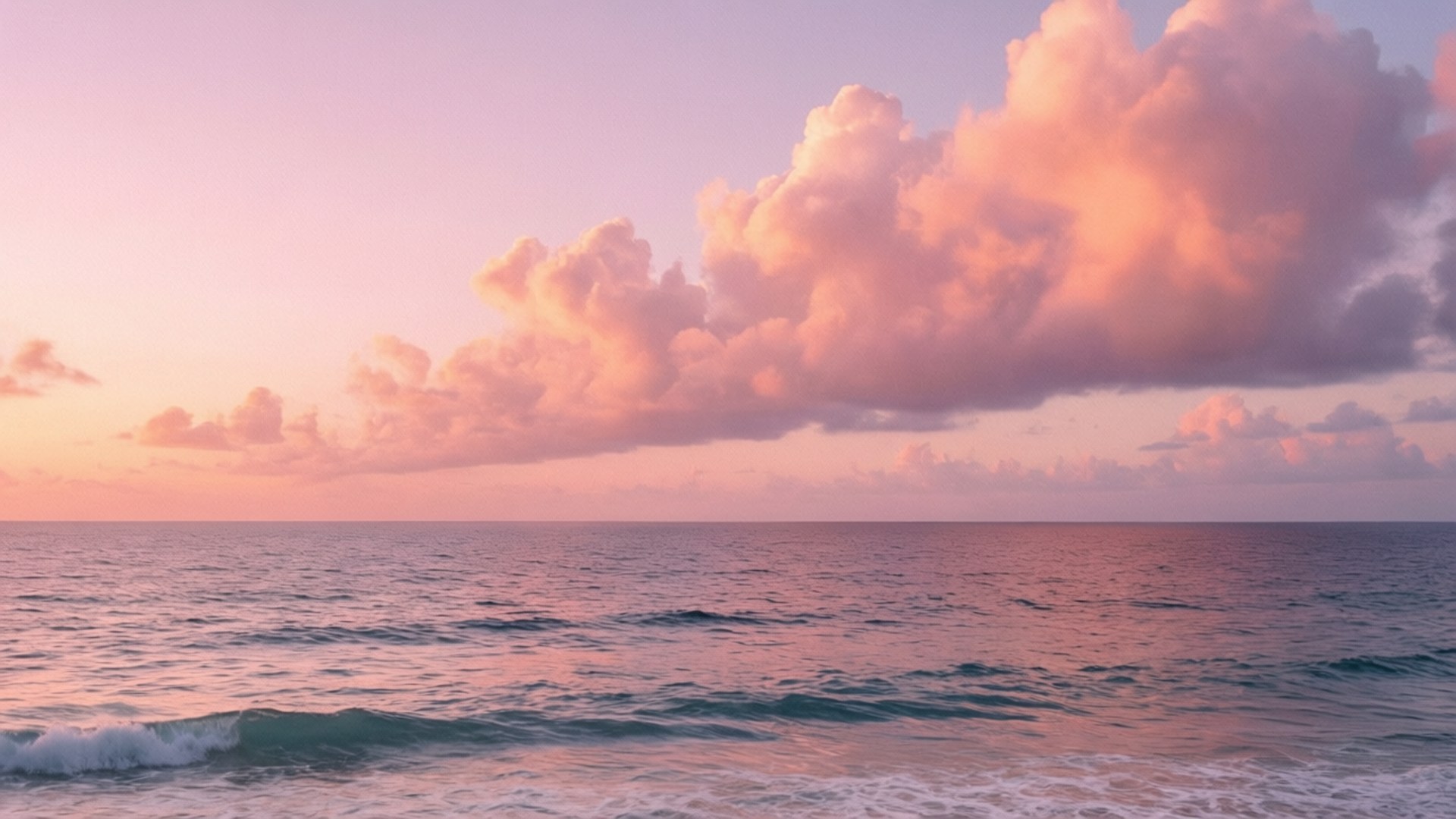 Pastel na Paglubog ng Araw sa Karagatan Wallpaper