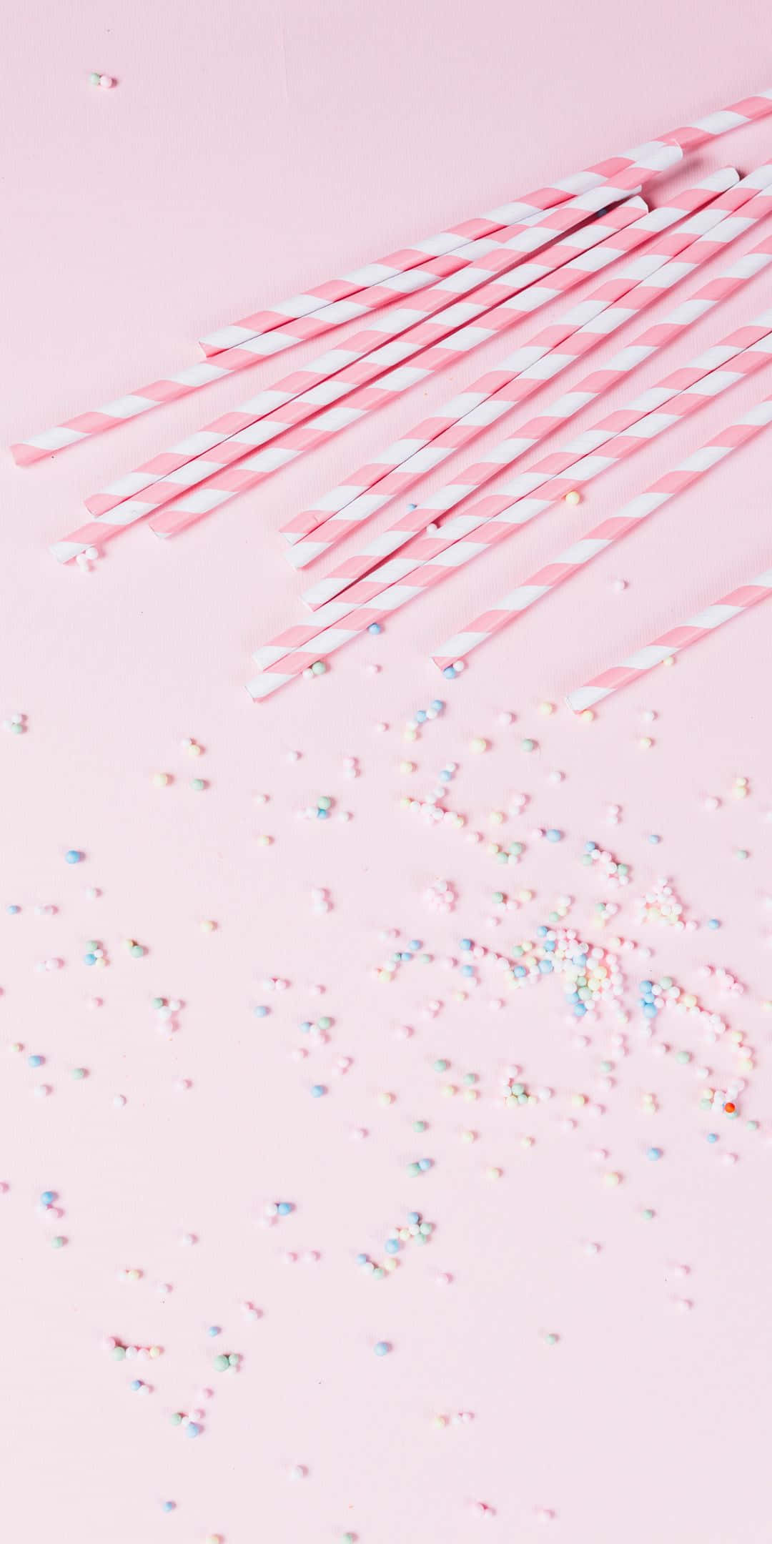 Pink Straw At Sprinkles Background Wallpaper