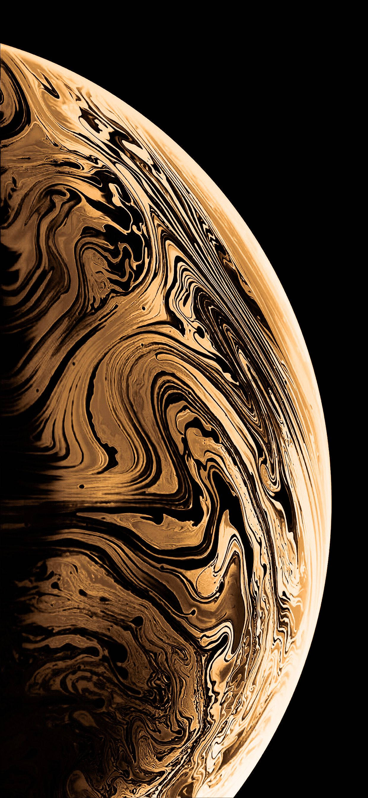 Planetang Ginto ng iPhone 12 Pro Max Wallpaper