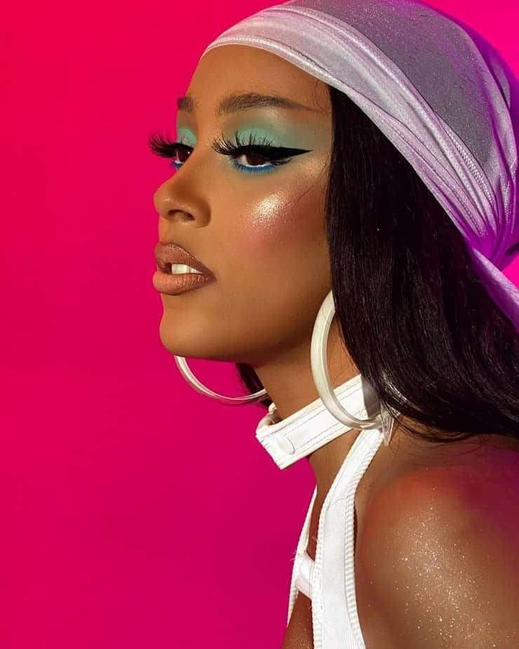 R&B Singer na si Doja Cat na nagpeperform sa entablado Wallpaper