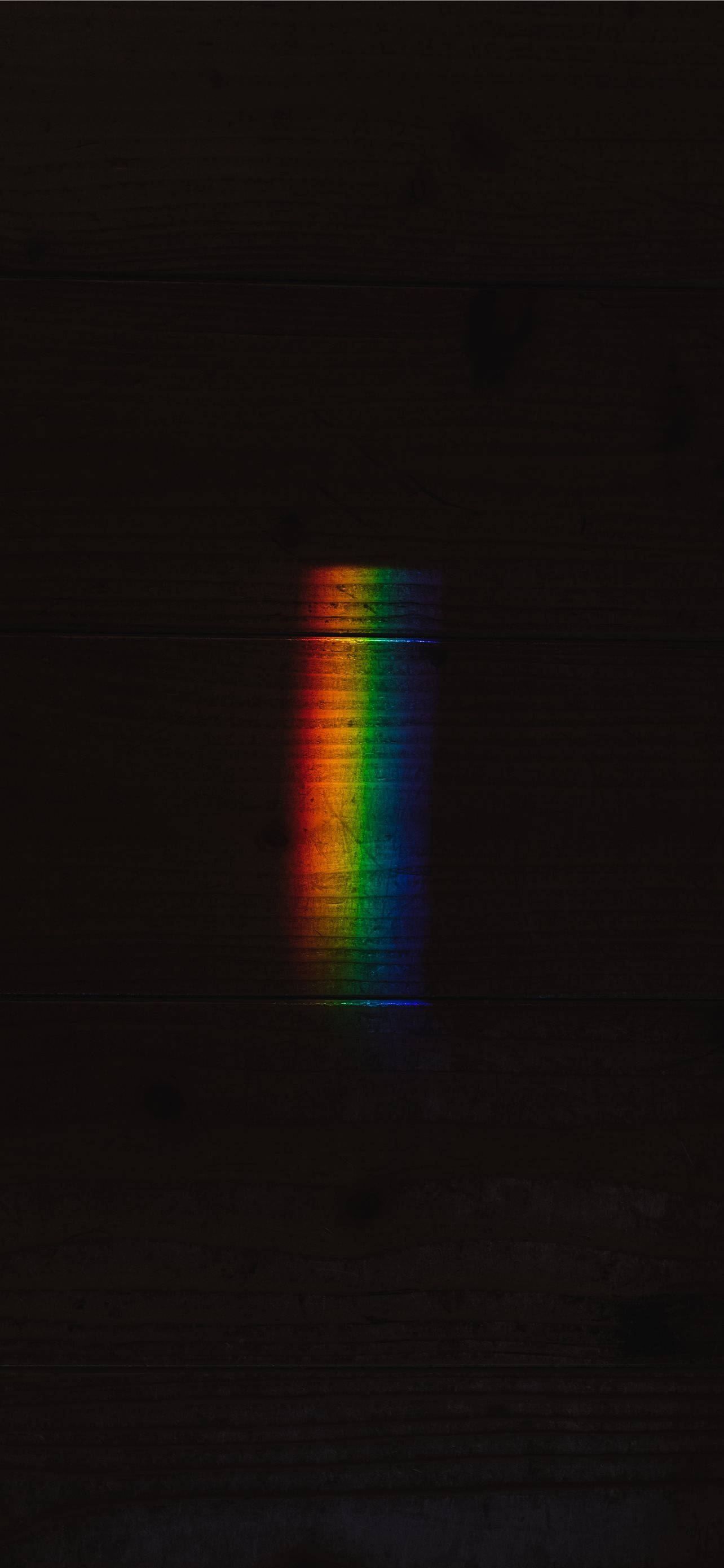 Rainbow Light In Black Apple iPhone Wallpaper