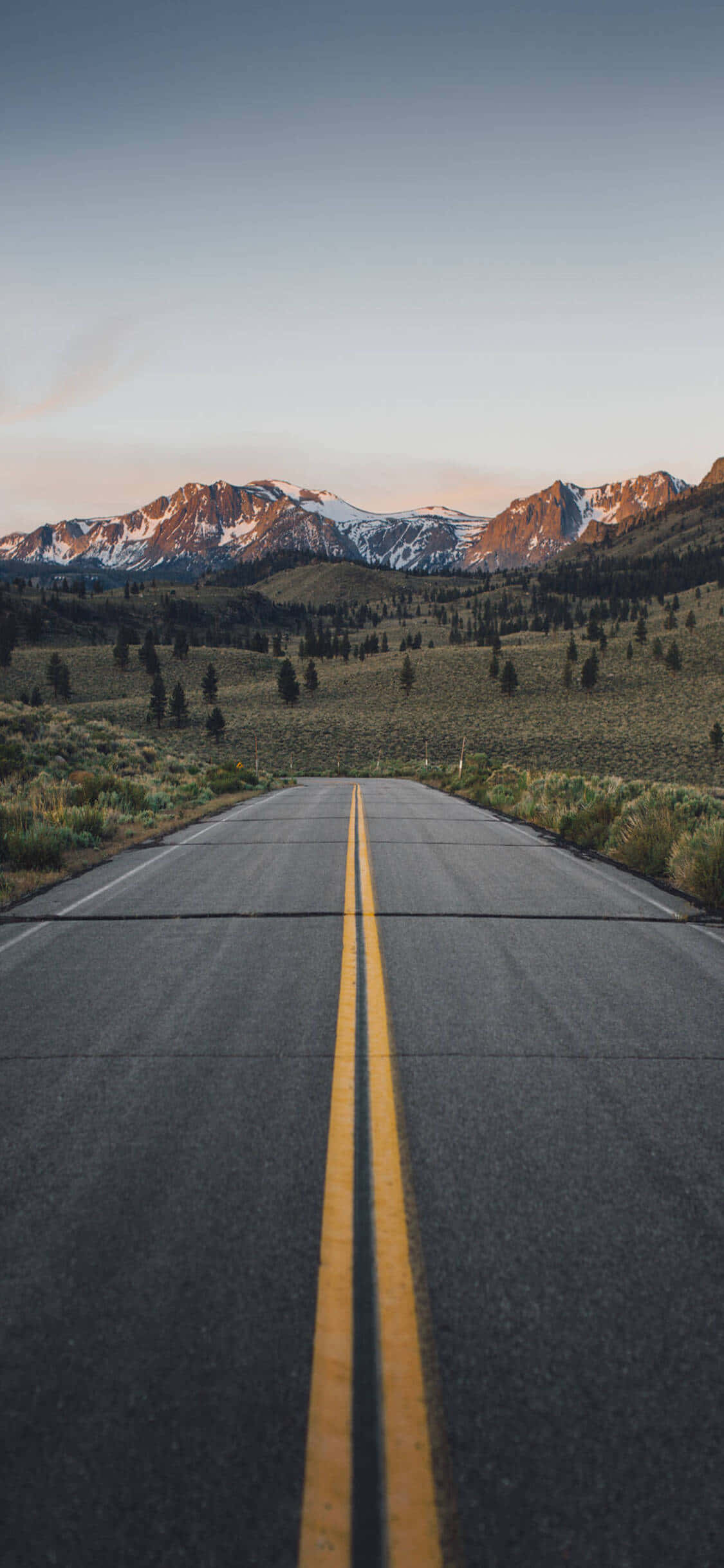 Ramdam ang mahika ng isang magandang paglubog ng araw sa California kasama ang iPhone X Wallpaper